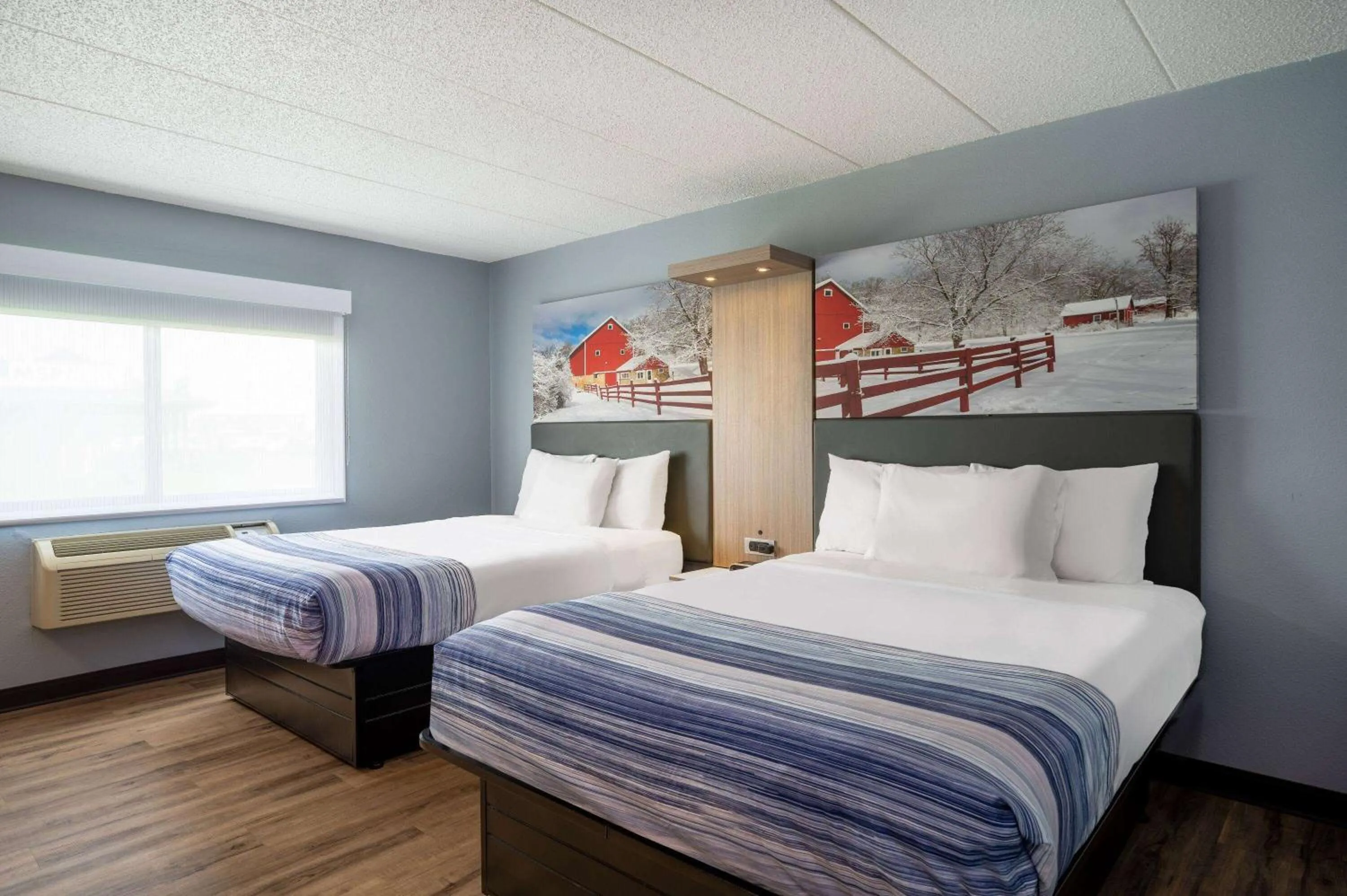 Photo of the whole room, Bed in AmericInn by Wyndham Eau Claire
