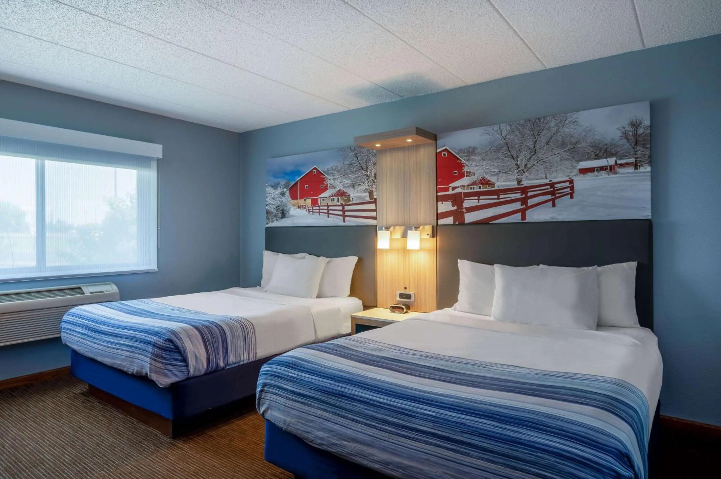 Photo of the whole room, Bed in AmericInn by Wyndham Eau Claire
