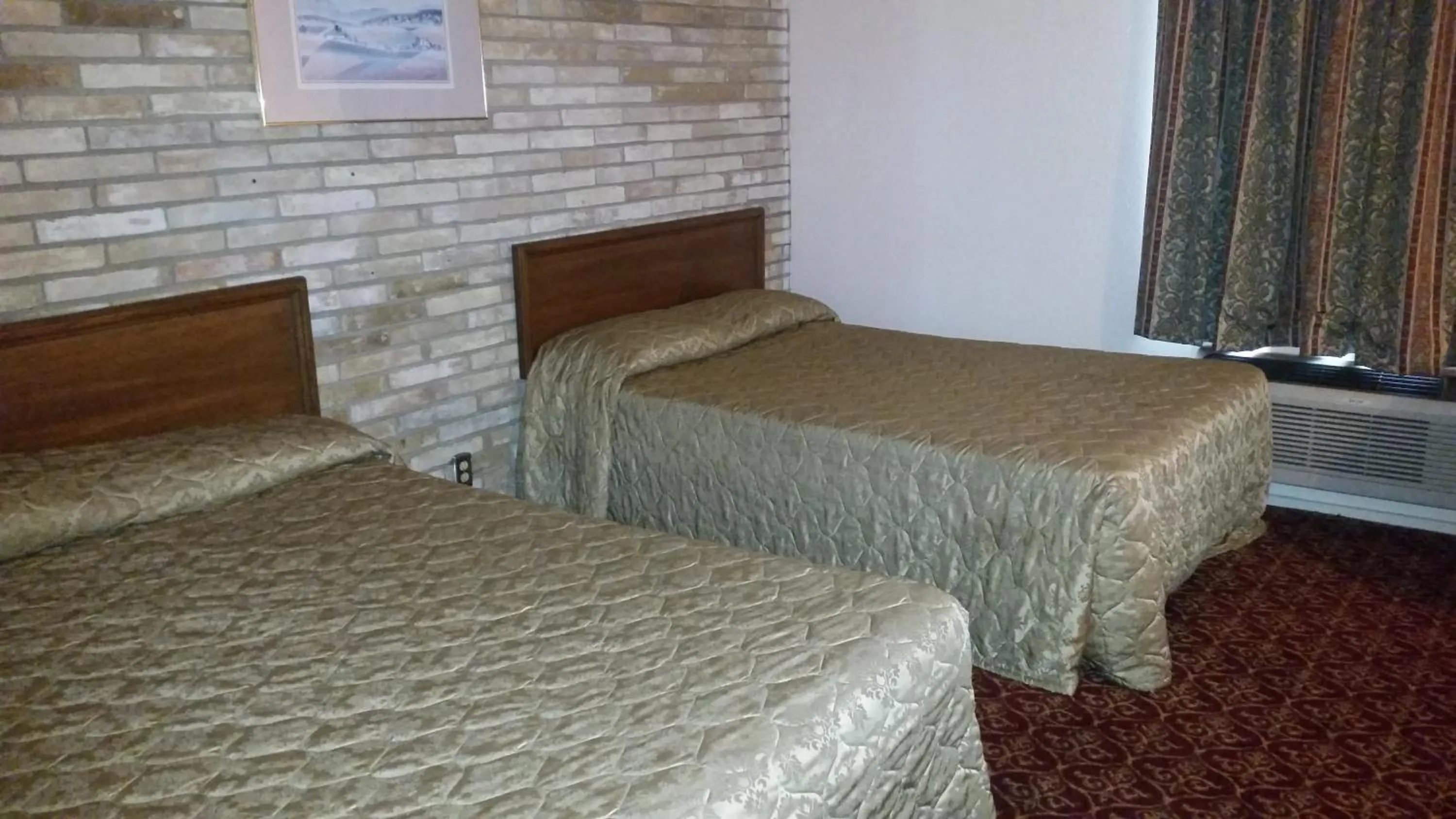 Bedroom, Bed in Executive Inn and Suites Waxahachie