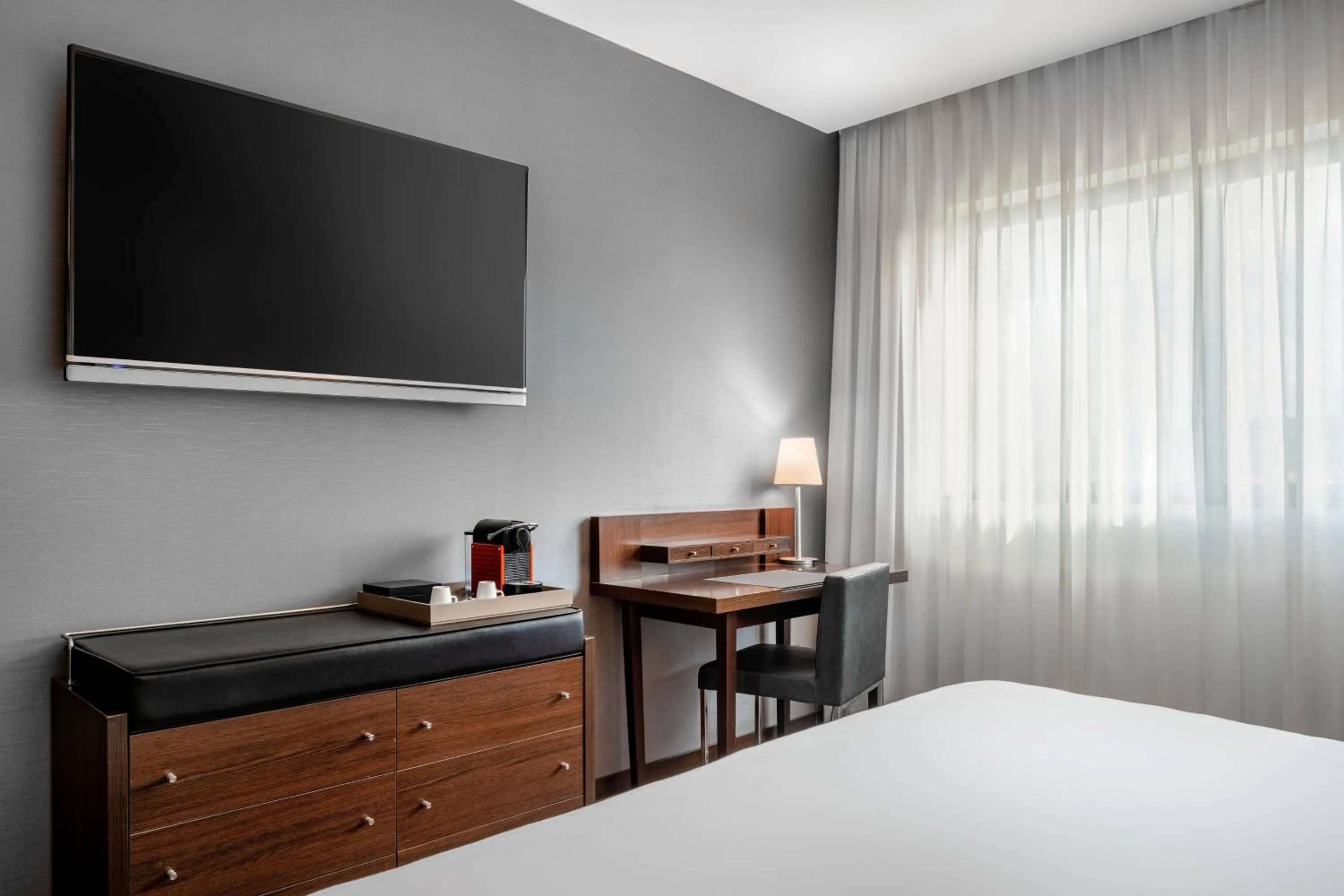 Photo of the whole room, Bed in AC Hotel Gijón by Marriott