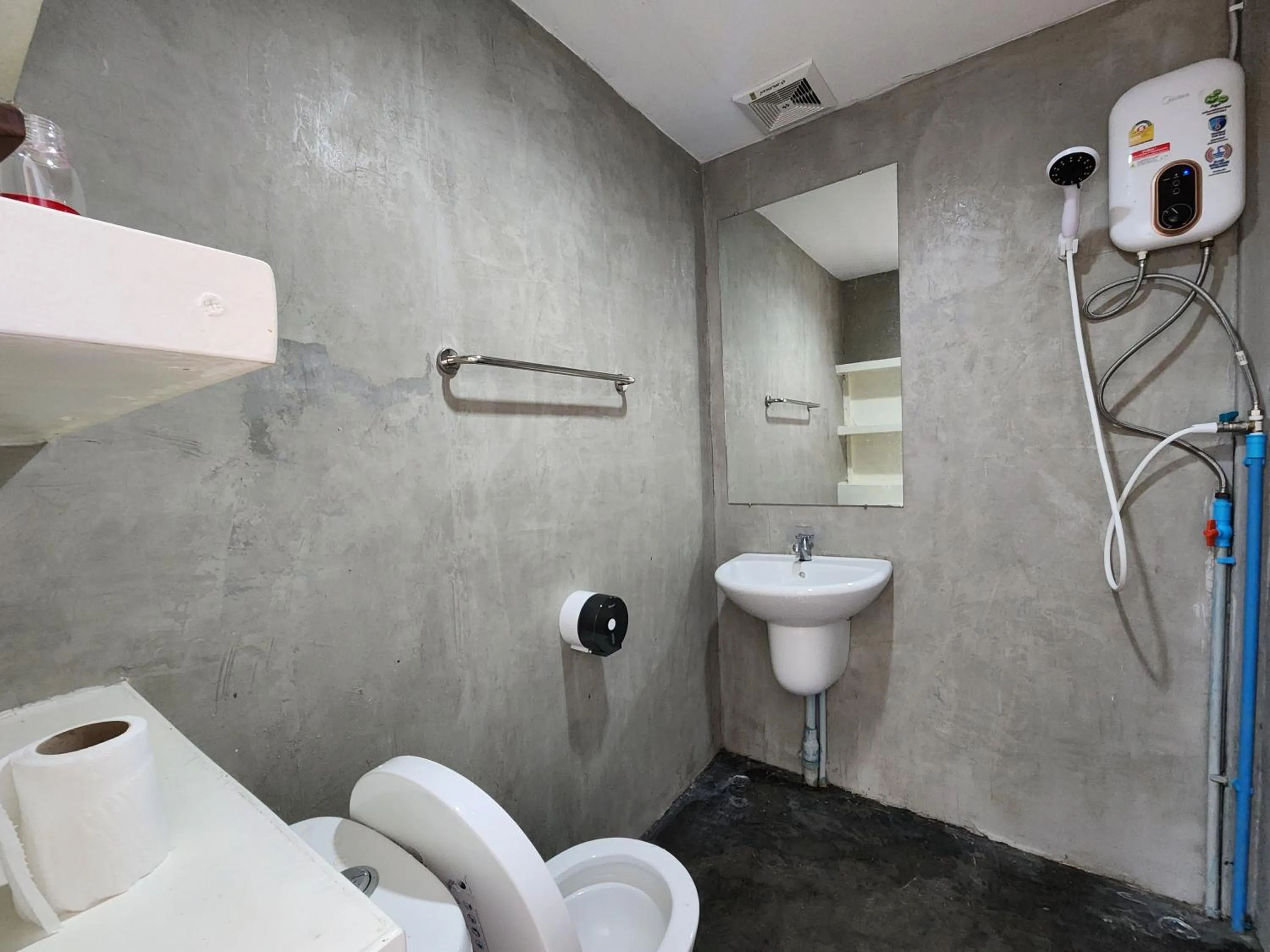 Bathroom in บ้านไร่ วรรณ วาลย์ รีสอร์ท