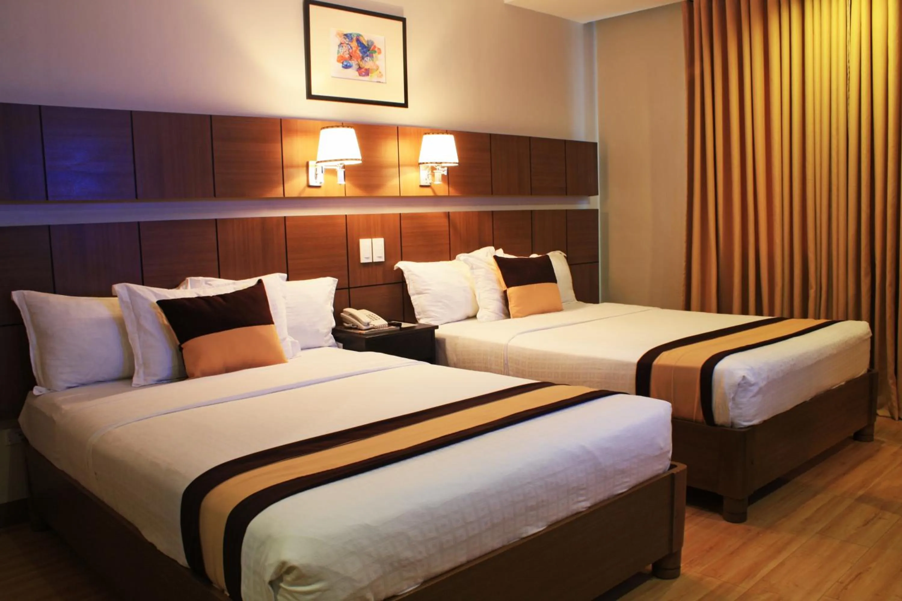 Photo of the whole room, Bed in The Pinnacle Hotel and Suites