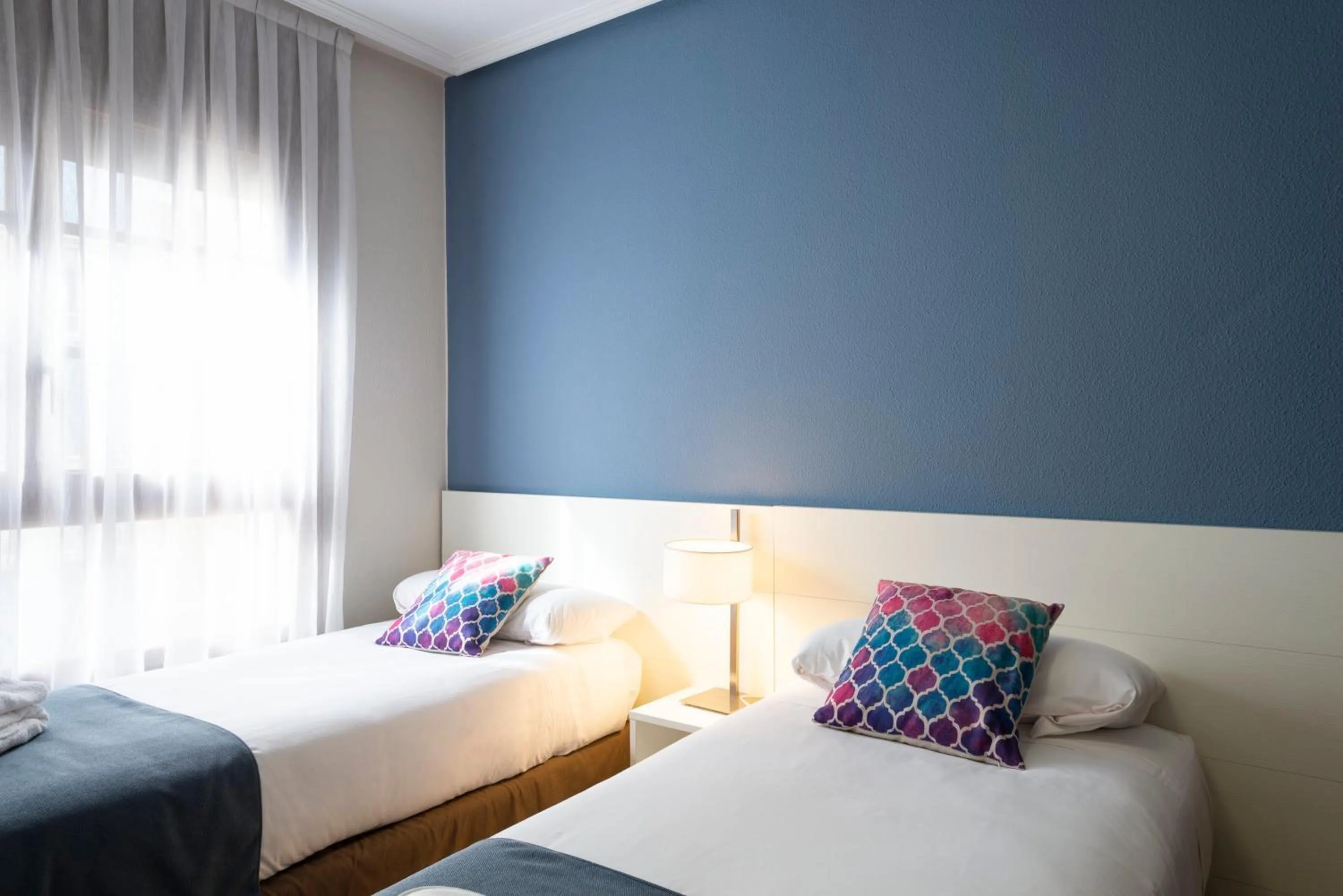 Bed in Aparthotel Los Girasoles