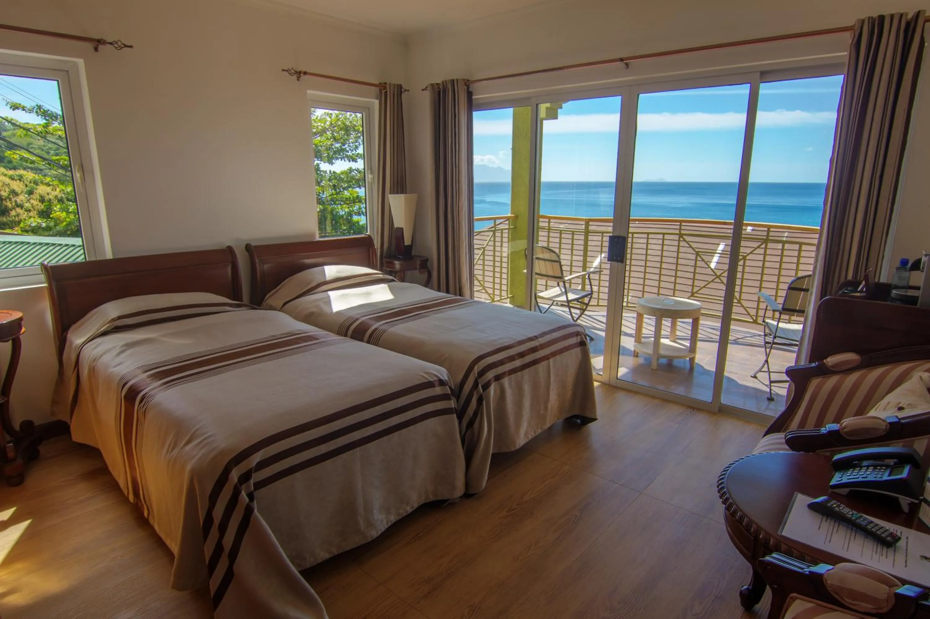 Bedroom, Bed in Treasure Cove Hotel & Restaurant