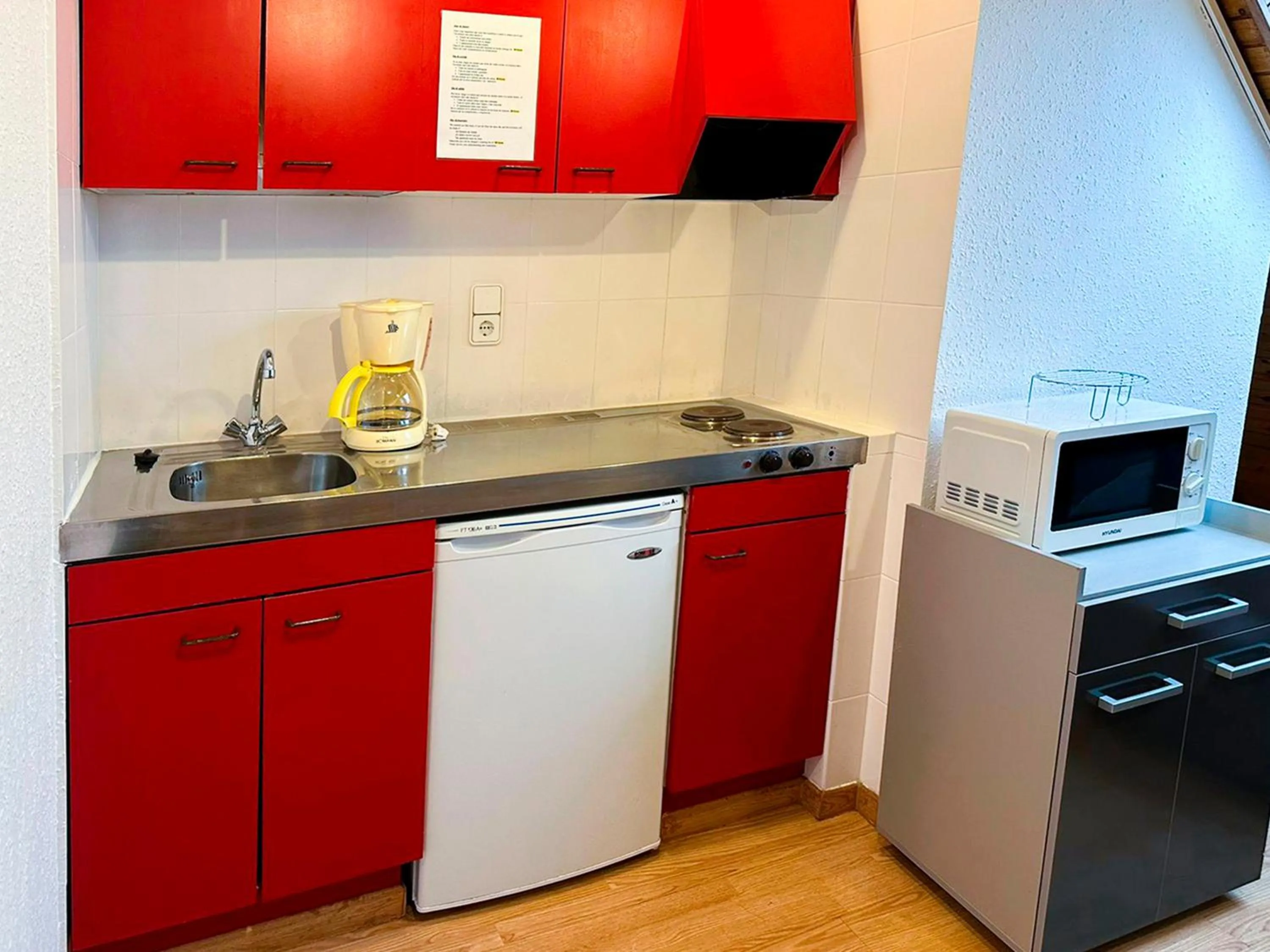 Kitchen or kitchenette in Apartamentos Solaris 3000