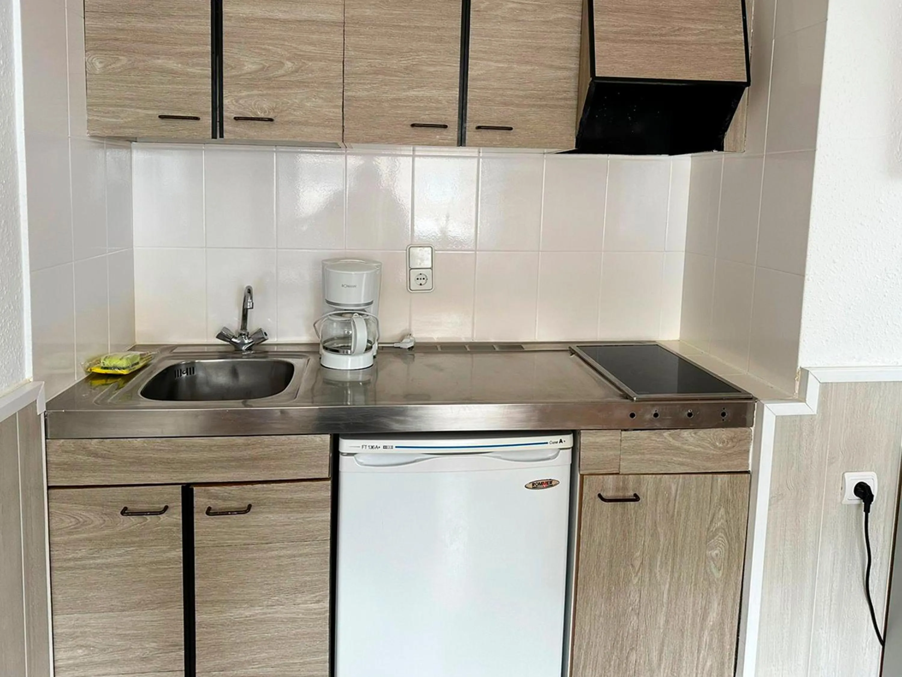 Kitchen or kitchenette in Apartamentos Solaris 3000