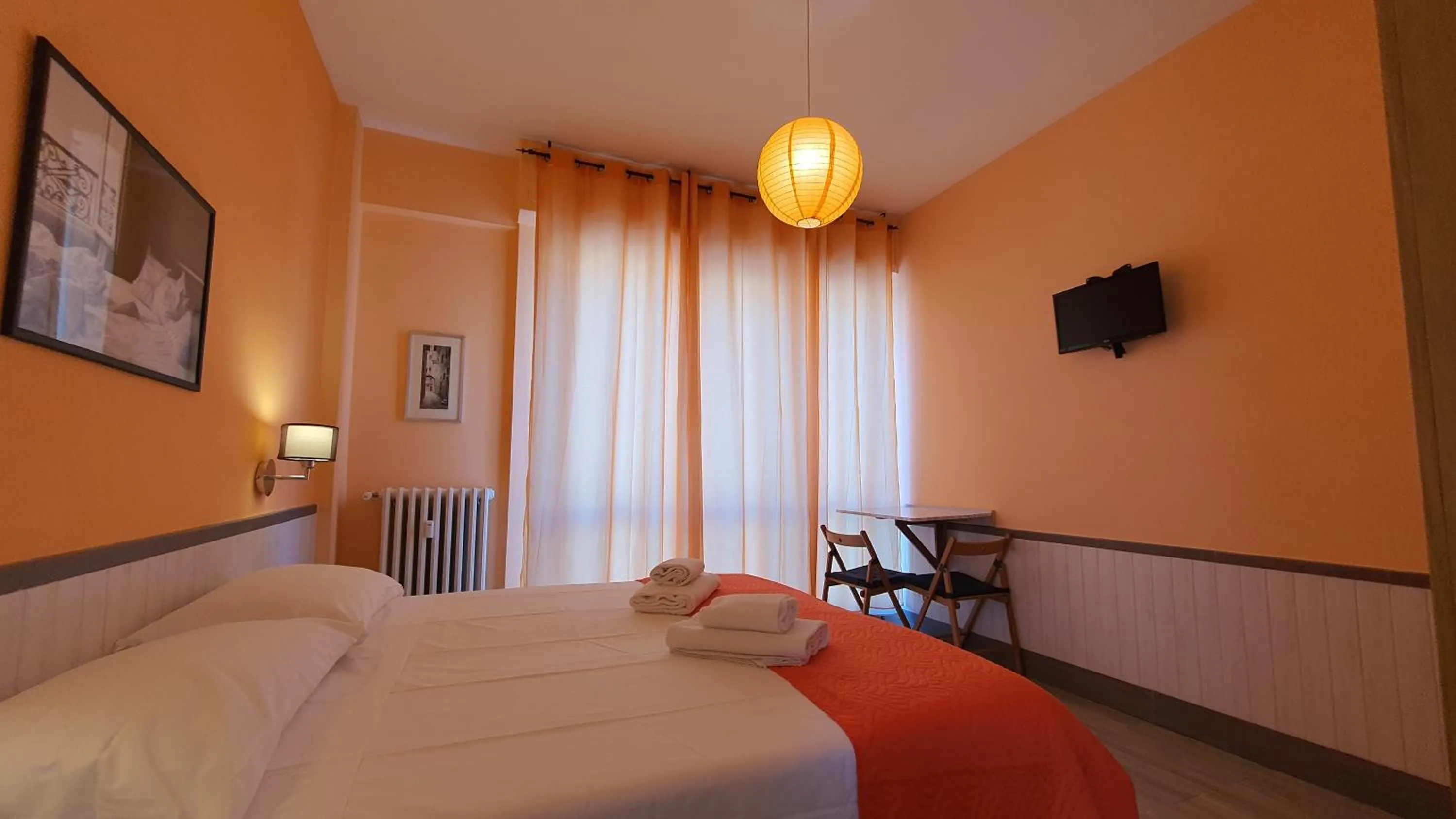 Bed in Il Giglio Guest House