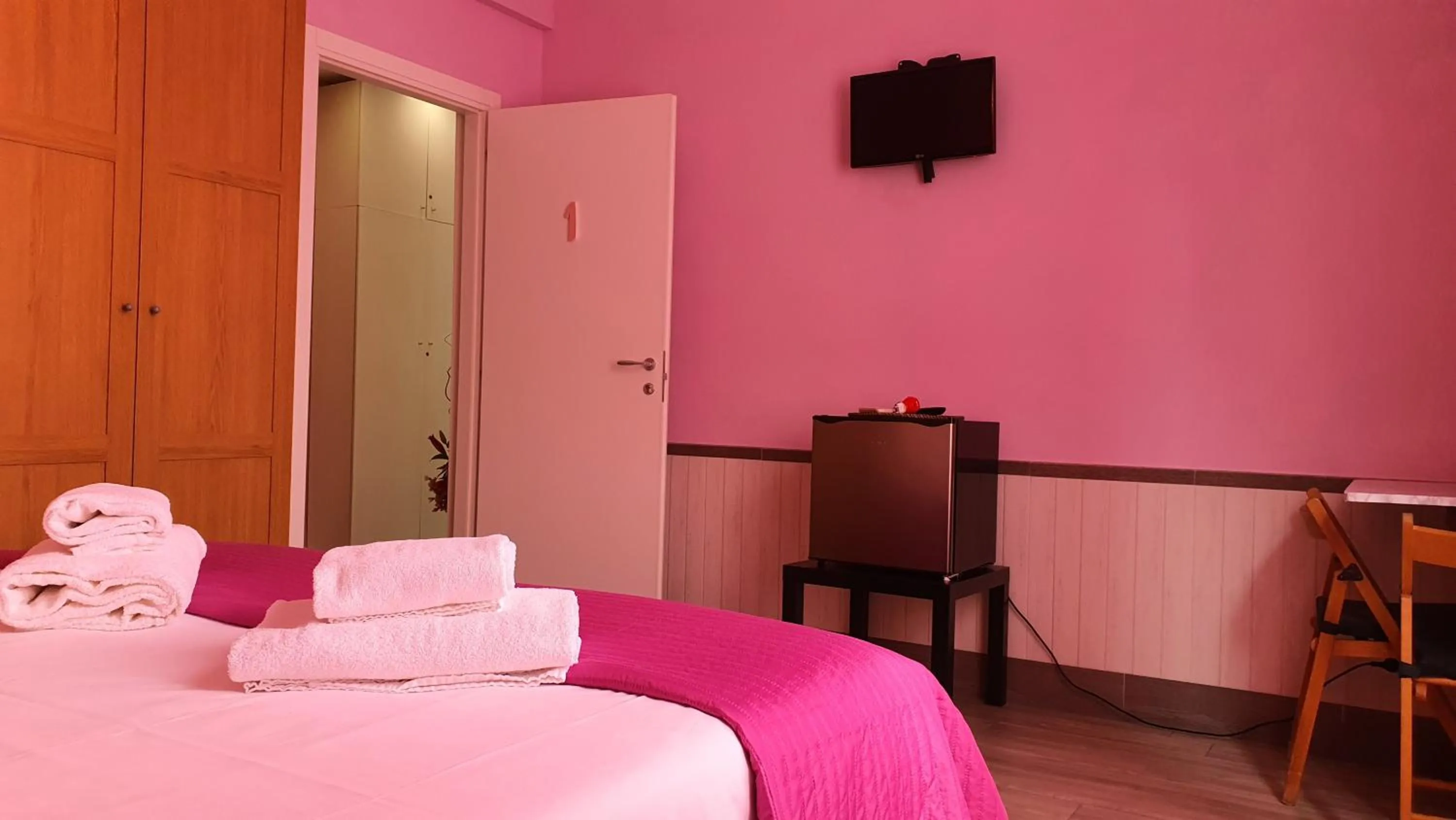 Bed in Il Giglio Guest House