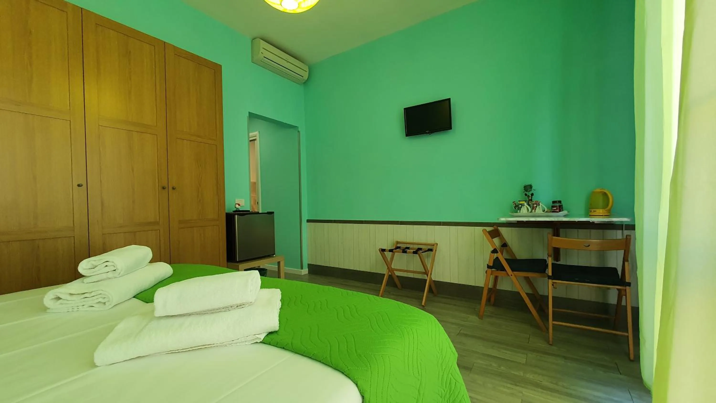 Bed in Il Giglio Guest House