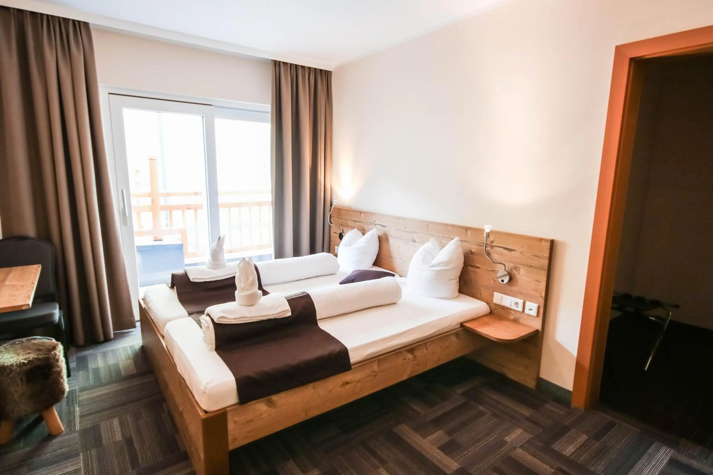 Bed in Hotel der Wolkensteinbär