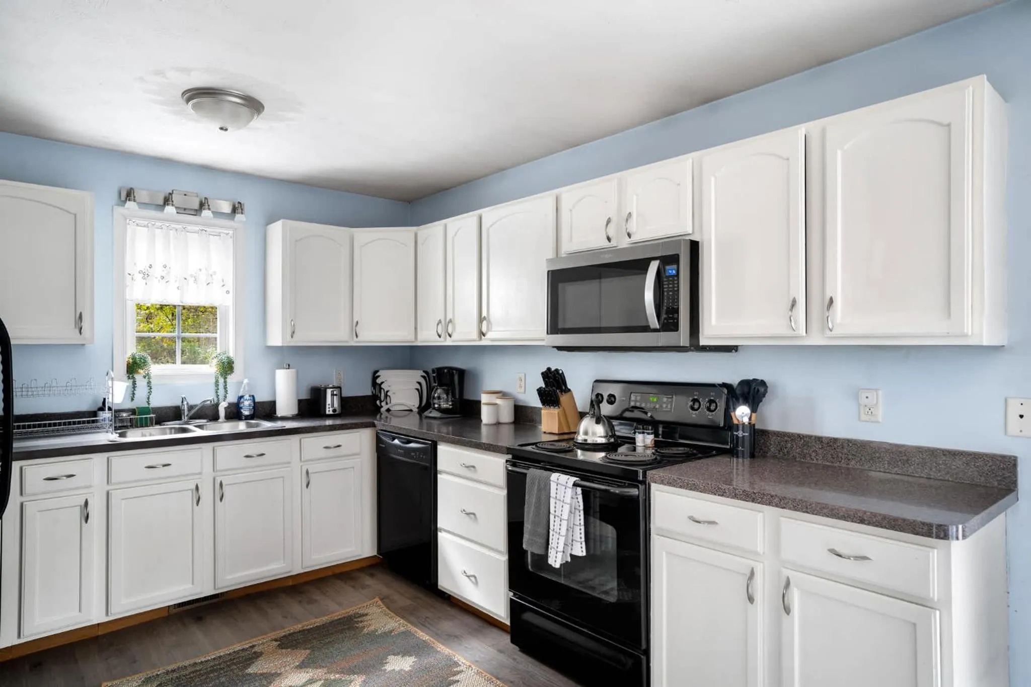 Kitchen or kitchenette in Modern decor, Hot Tub, Fire Pit & River Access!