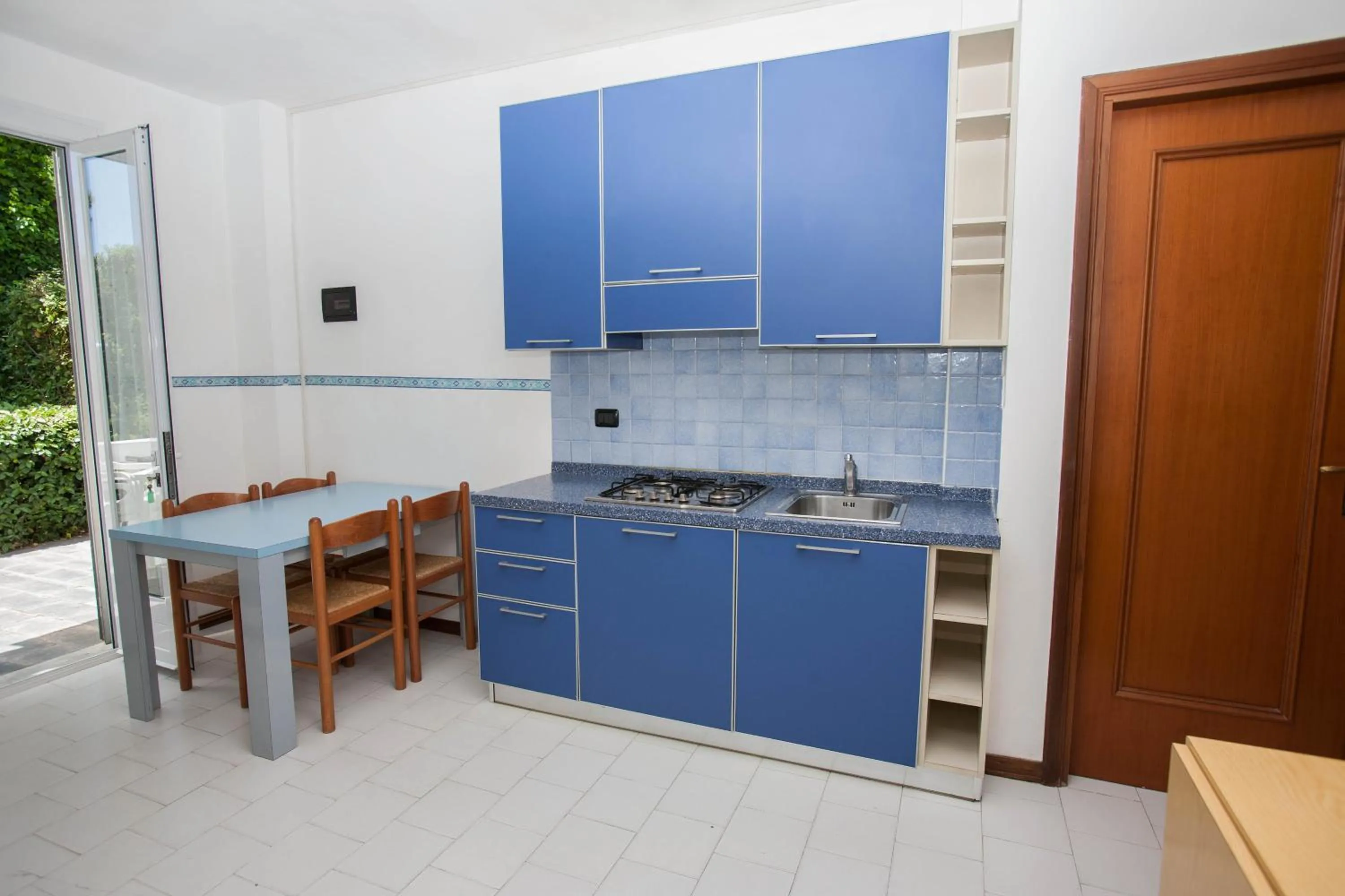 Kitchen or kitchenette in Residence RTA Villa Marina