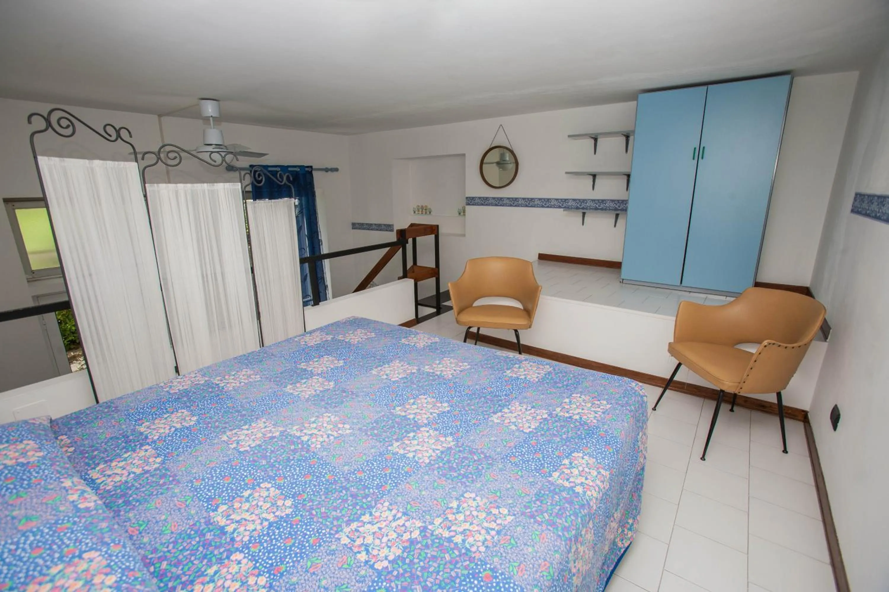 Photo of the whole room, Bed in Residence RTA Villa Marina