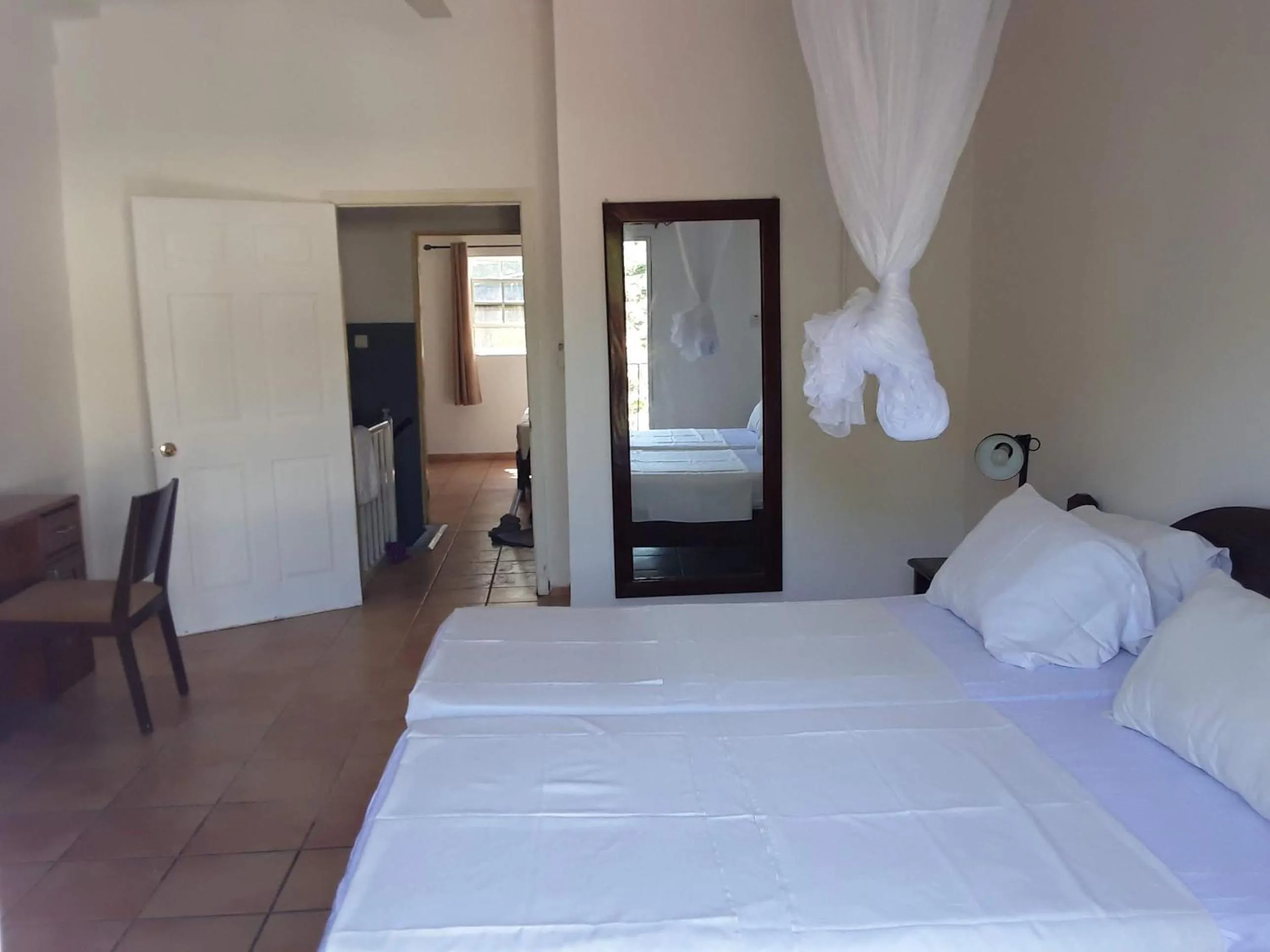 Bed in Riyan Apartment