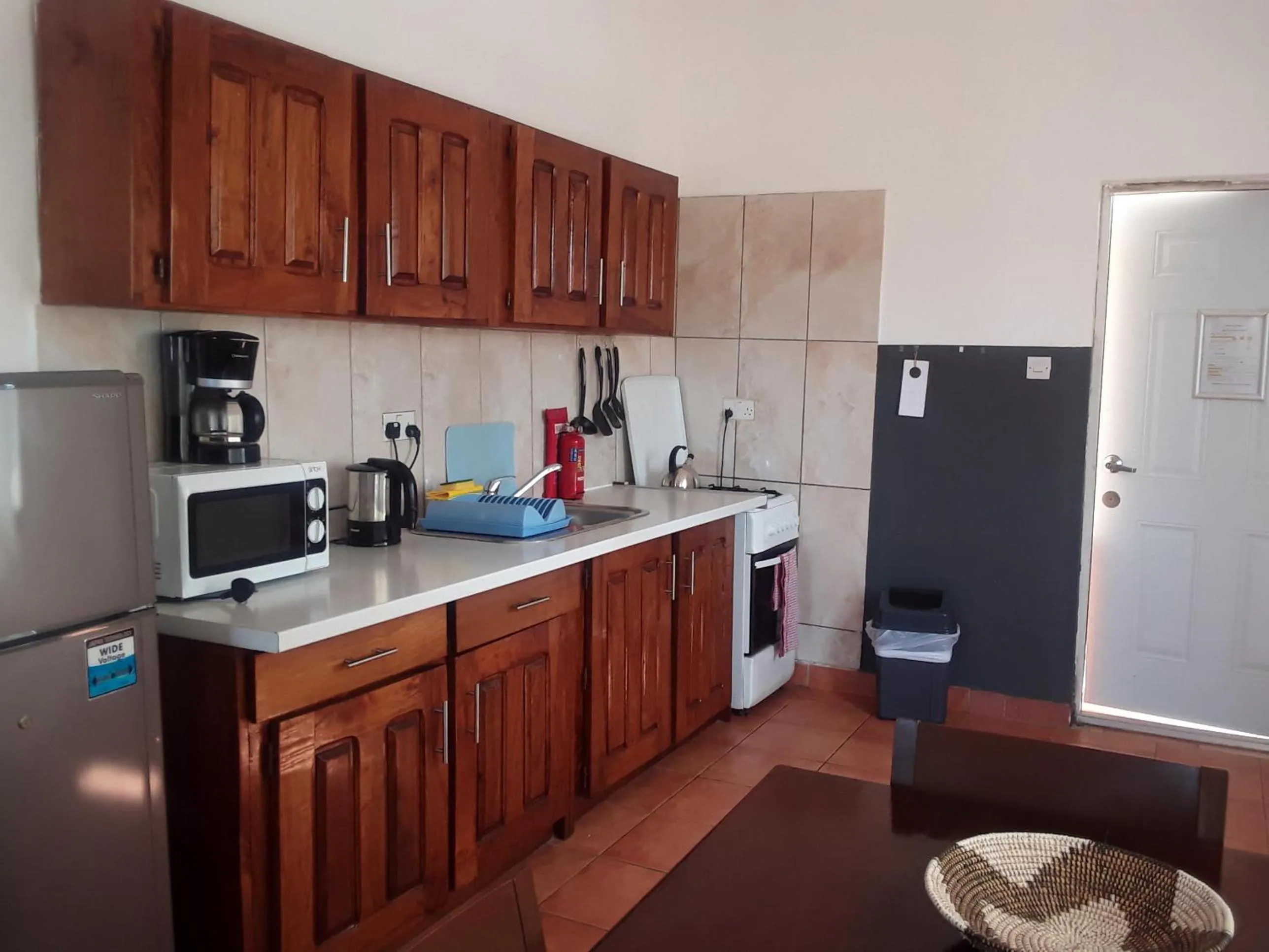 kitchen in Riyan Apartment