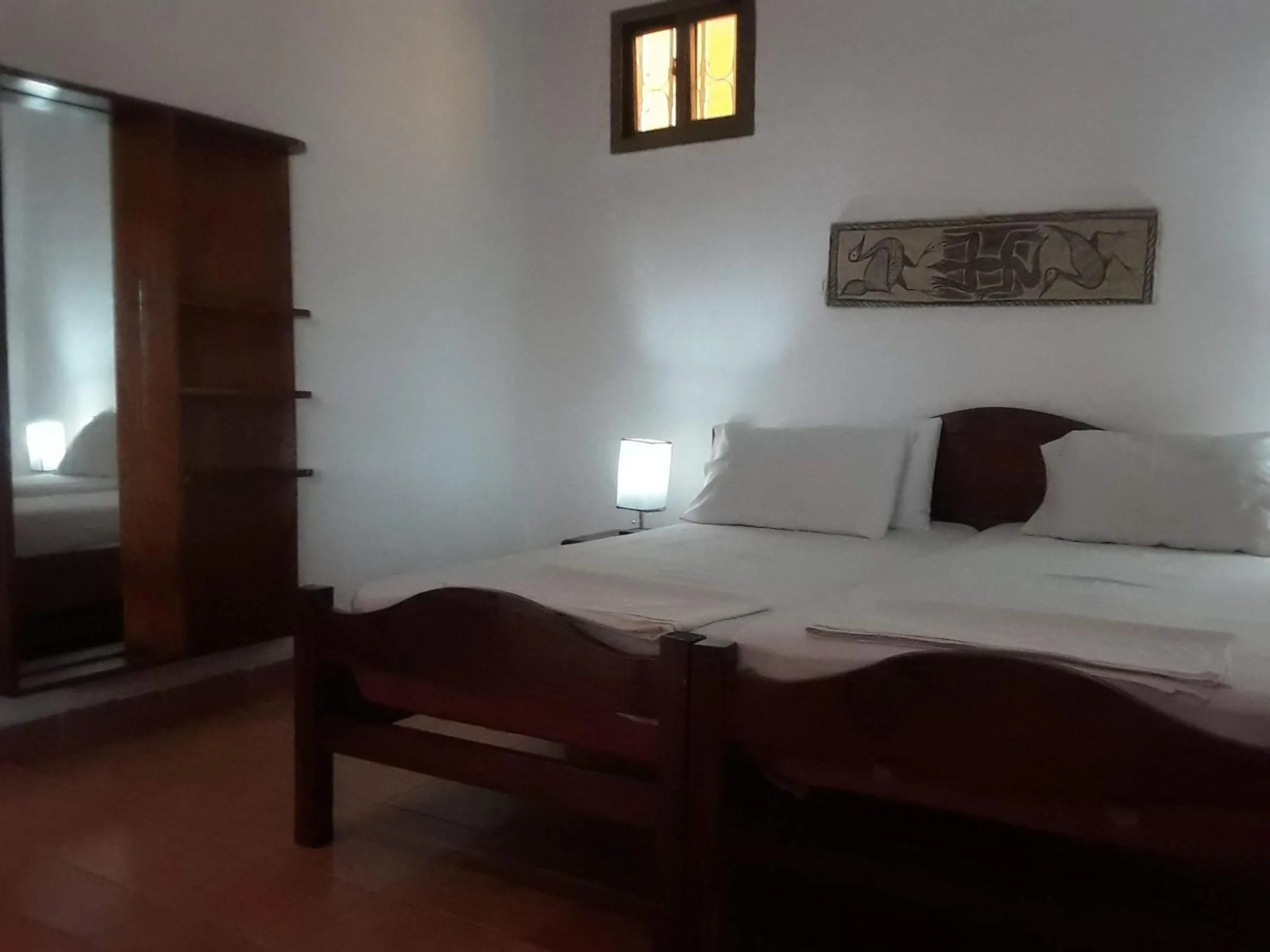 Bed in Riyan Apartment