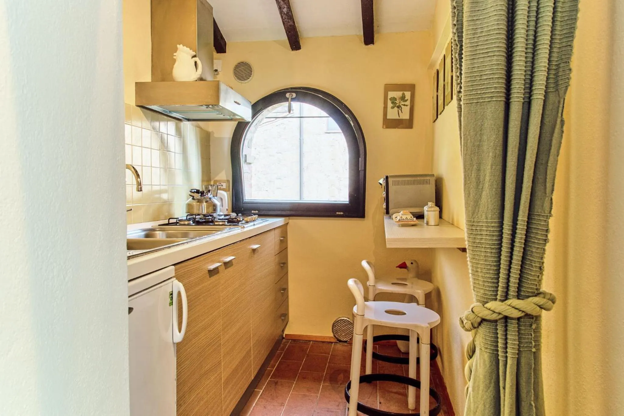 Kitchen or kitchenette in Affittacamere Maria Gabriella