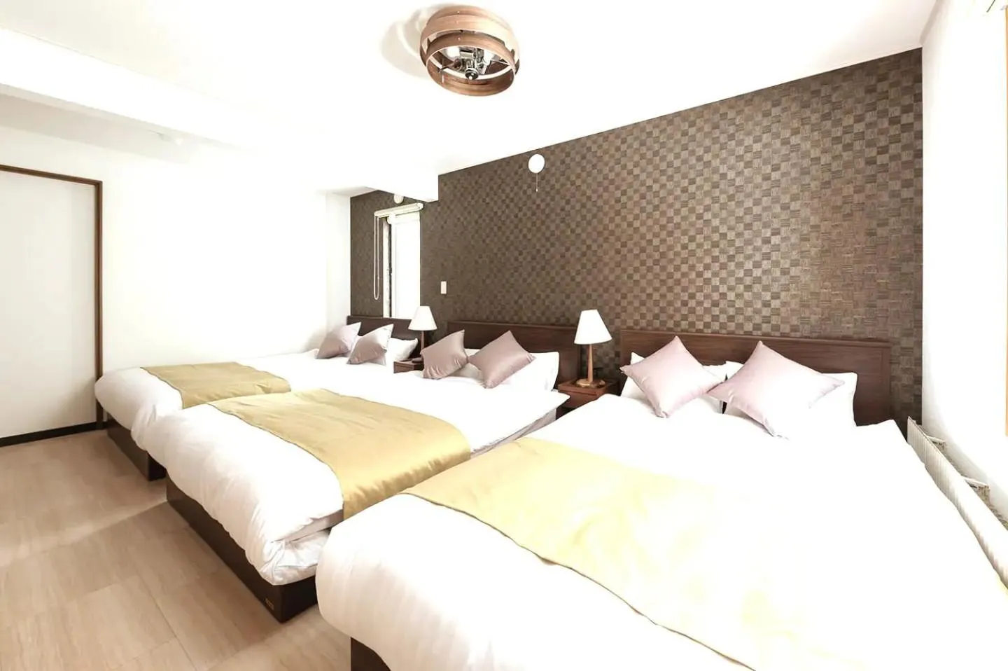 Bed in HONGO 11 HOTEL