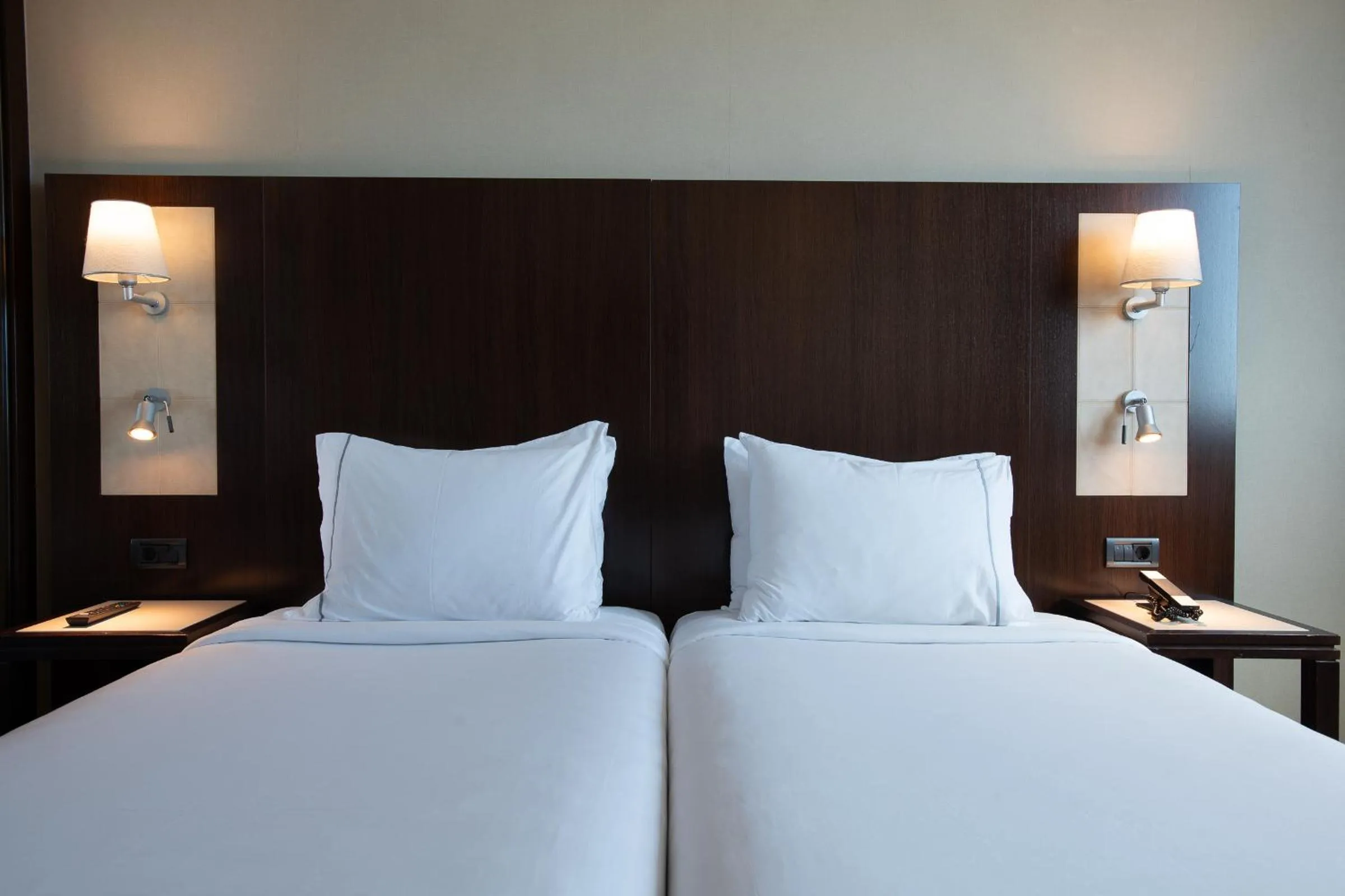 Bed in Leonardo Royal Hotel Barcelona Forum