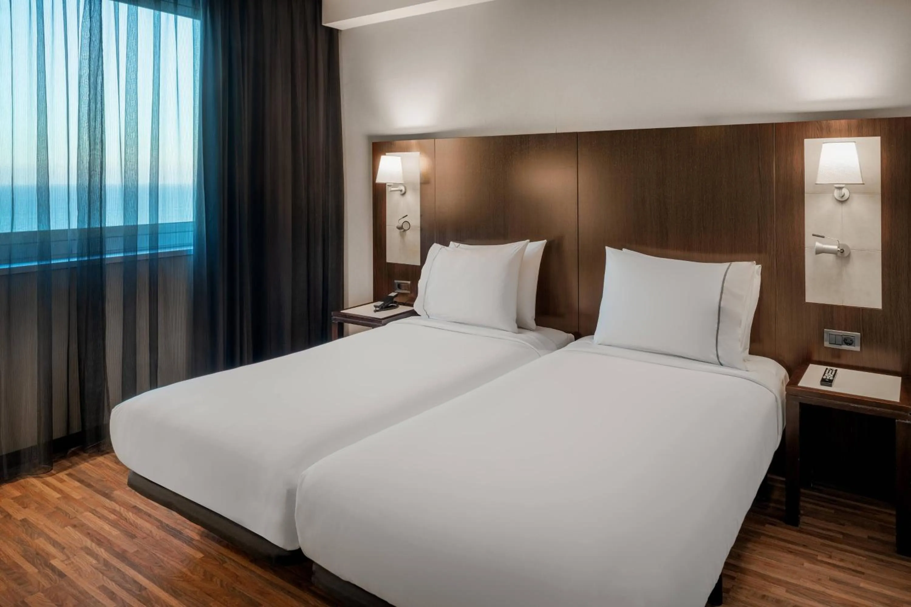 Photo of the whole room, Bed in AC Hotel Barcelona Fórum by Marriott