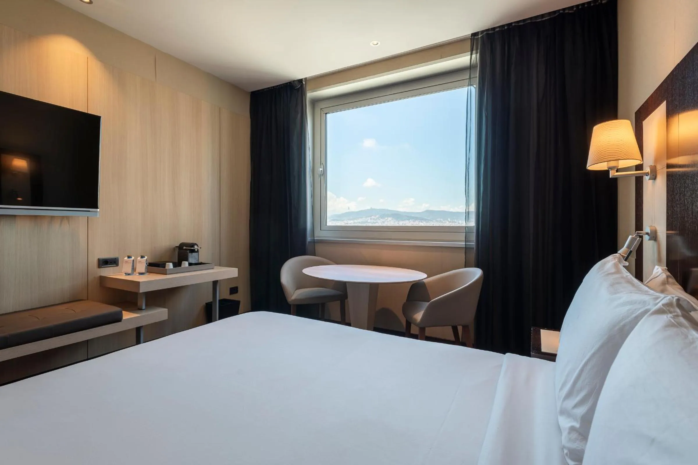 Bed in Leonardo Royal Hotel Barcelona Forum