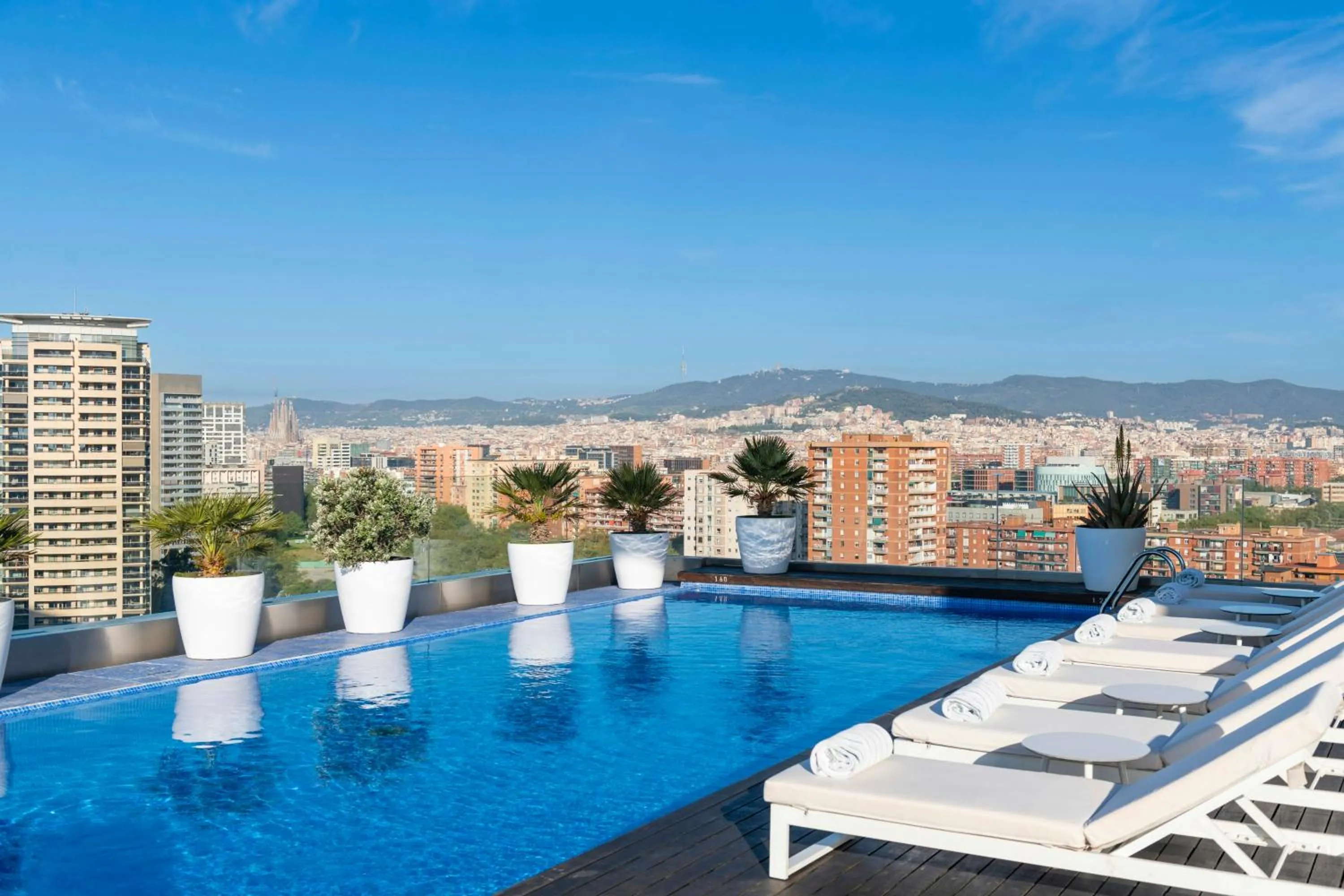 Swimming pool in Leonardo Royal Hotel Barcelona Forum