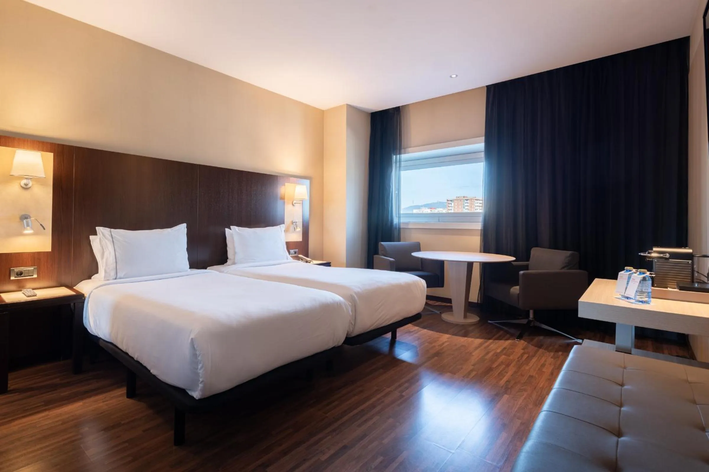 Bed in Leonardo Royal Hotel Barcelona Forum