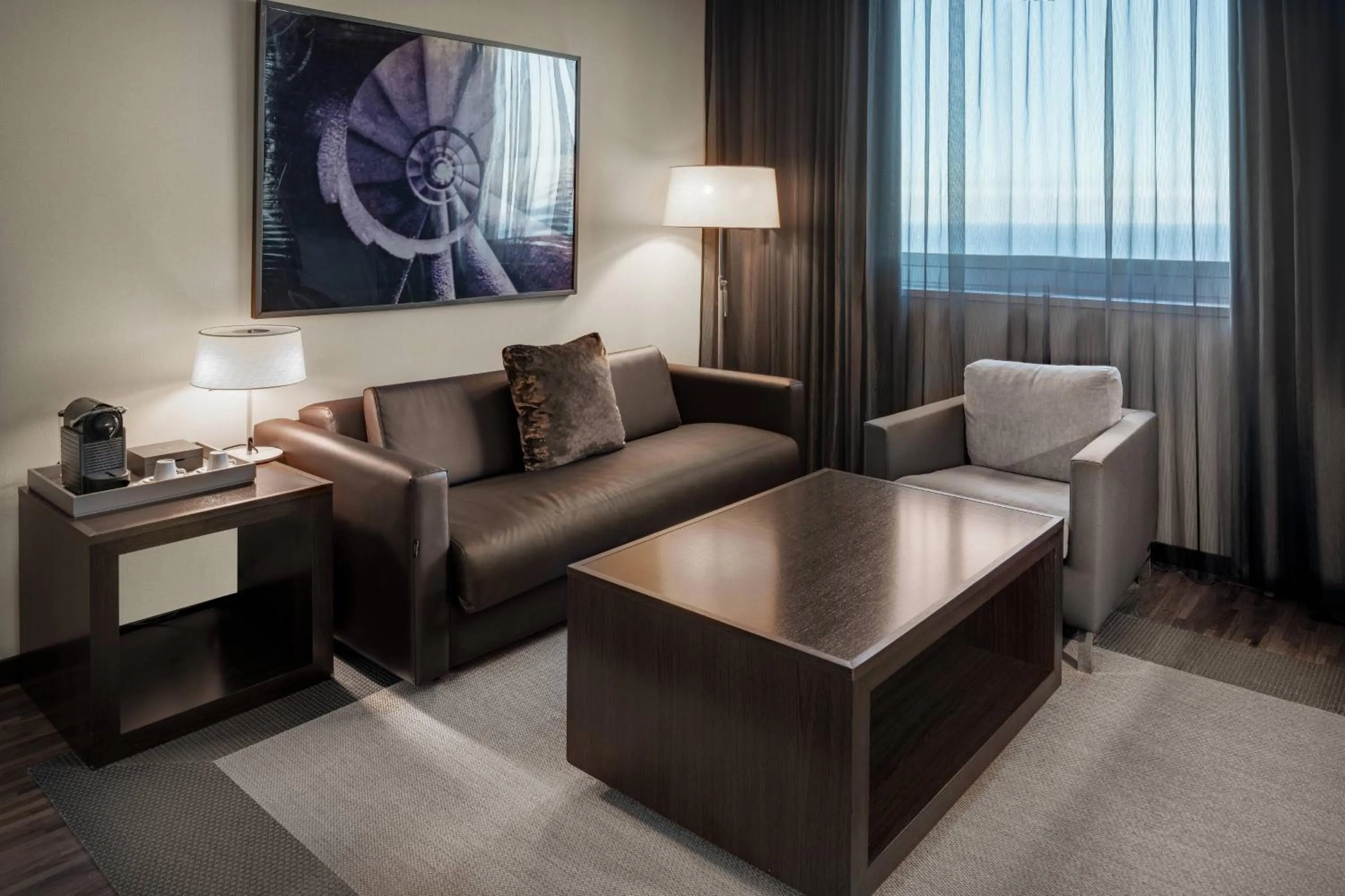 Living room in AC Hotel Barcelona Fórum by Marriott