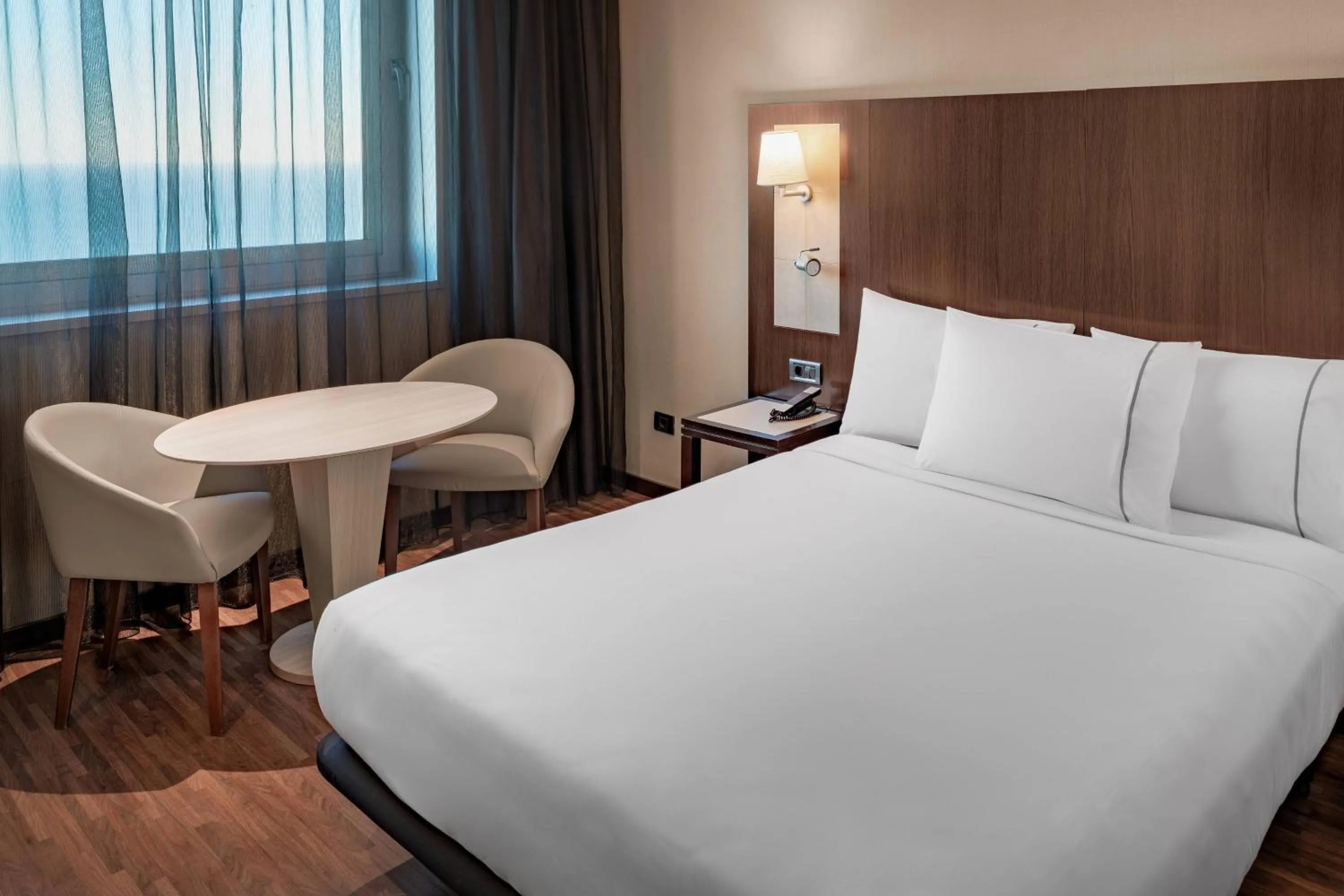 Photo of the whole room, Bed in AC Hotel Barcelona Fórum by Marriott