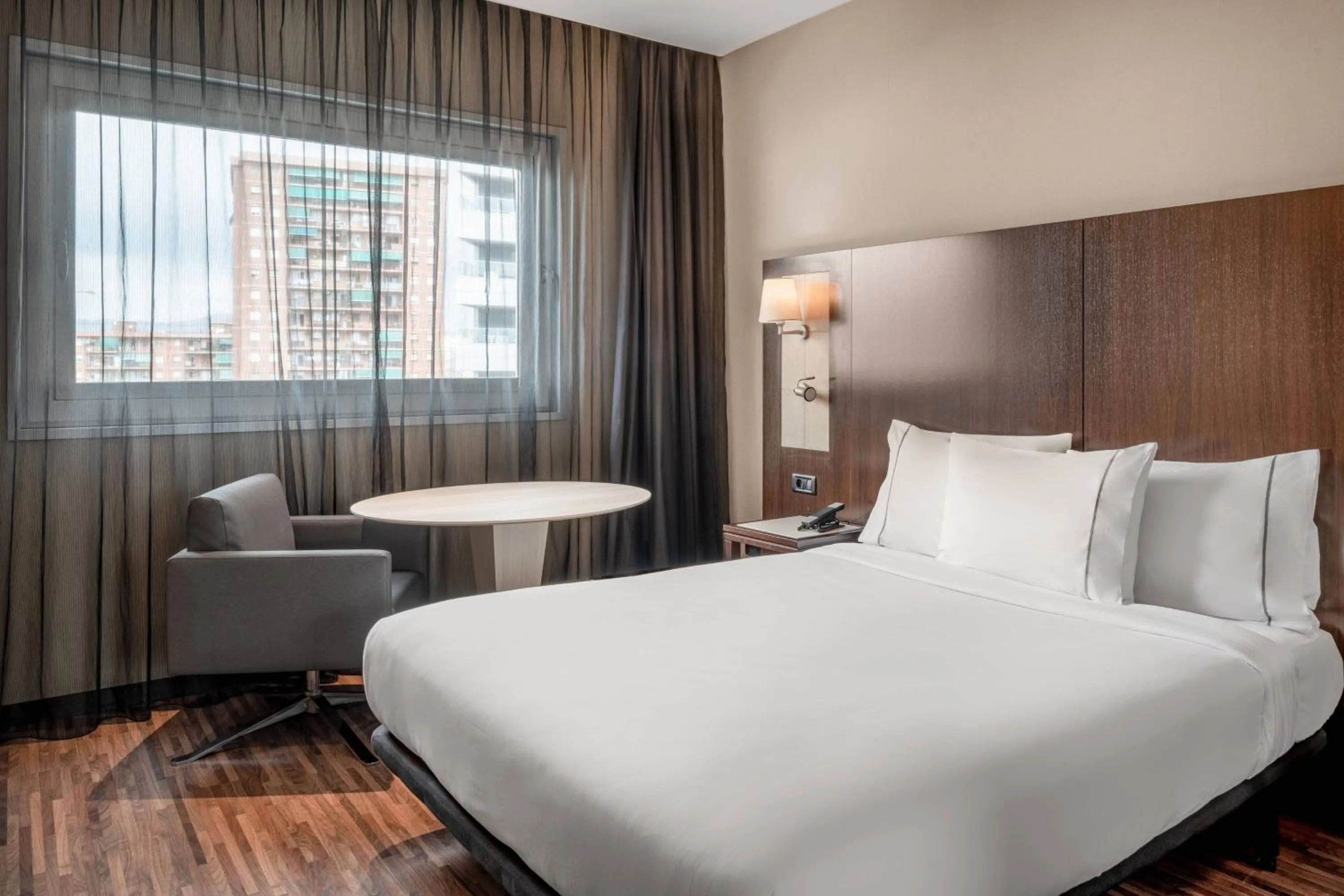 Photo of the whole room, Bed in AC Hotel Barcelona Fórum by Marriott
