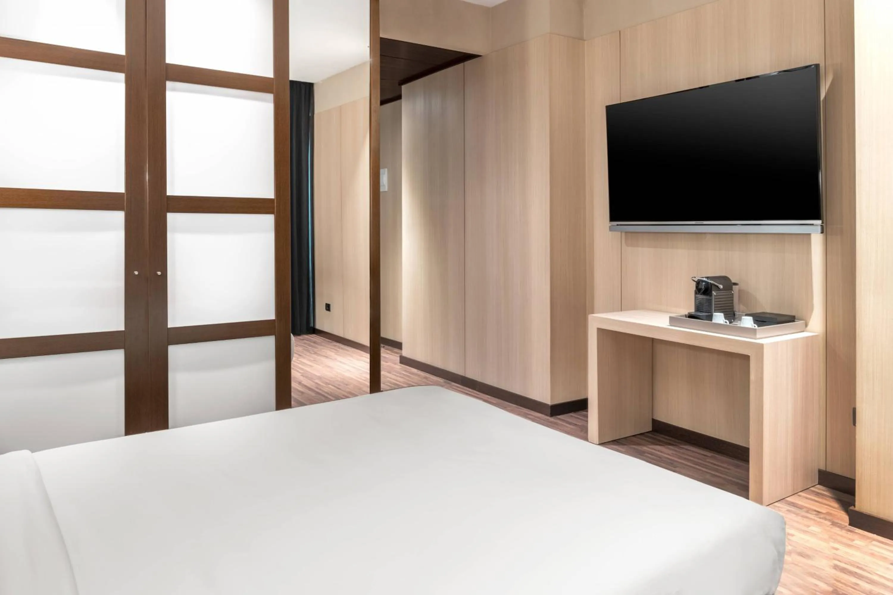 Photo of the whole room, Bed in AC Hotel Barcelona Fórum by Marriott