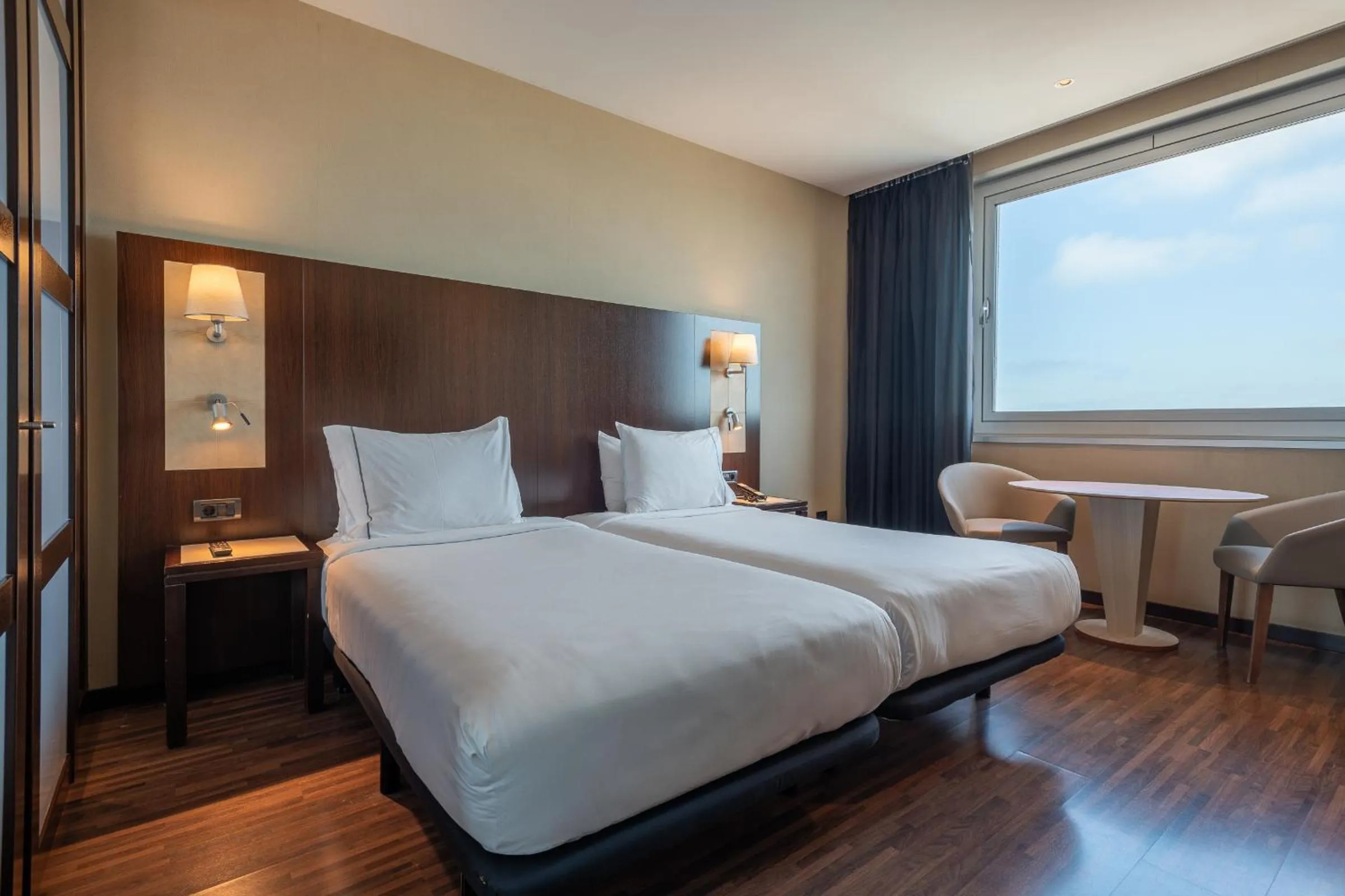 Bed in Leonardo Royal Hotel Barcelona Forum