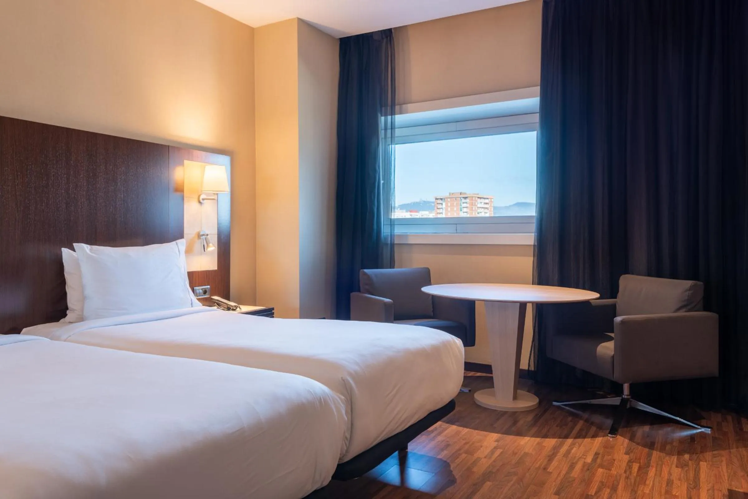 Bed in Leonardo Royal Hotel Barcelona Forum