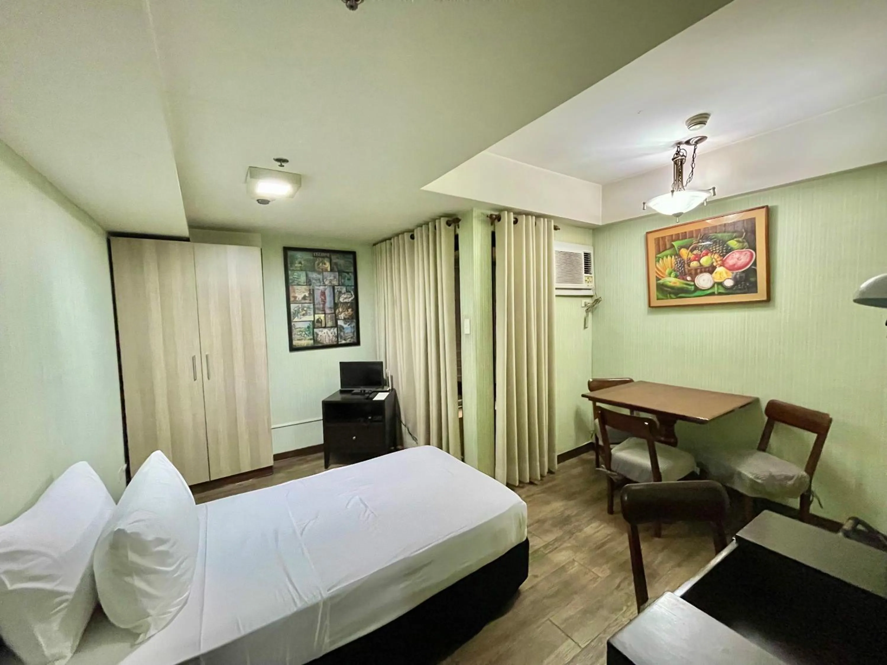 Photo of the whole room, Bed in CEO Flats