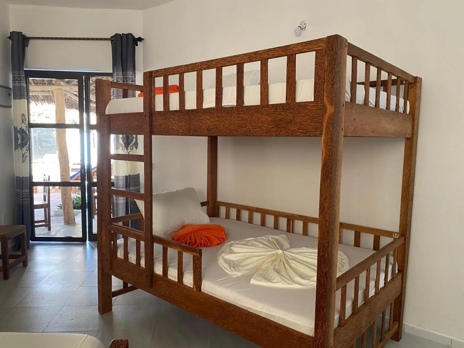 Bed in Amani Hotel Paje