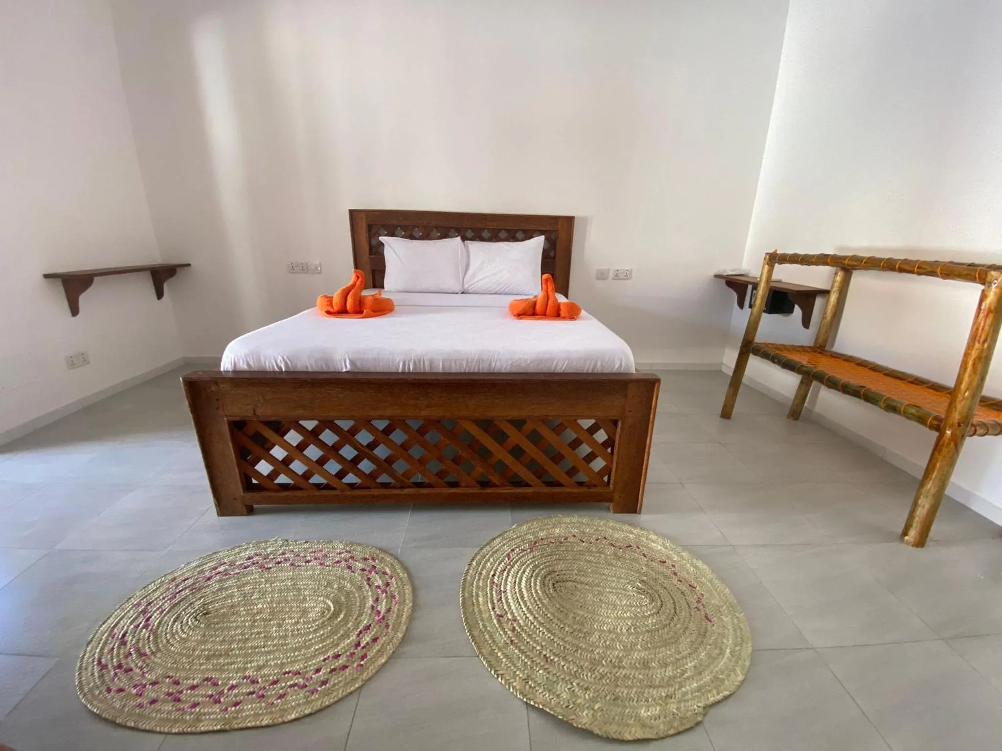 Bed in Amani Hotel Paje