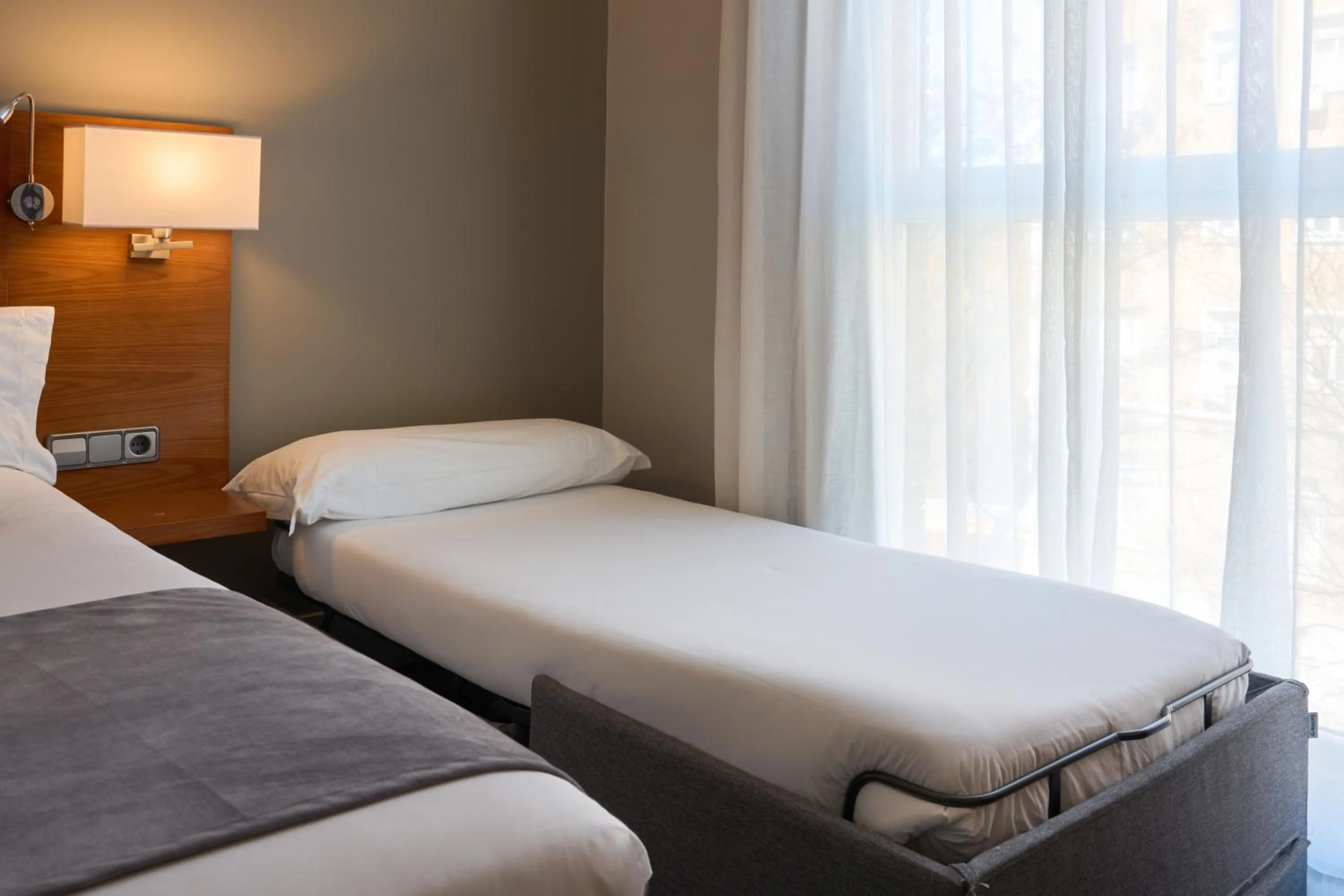 Bed in Hotel Puerta de Toledo