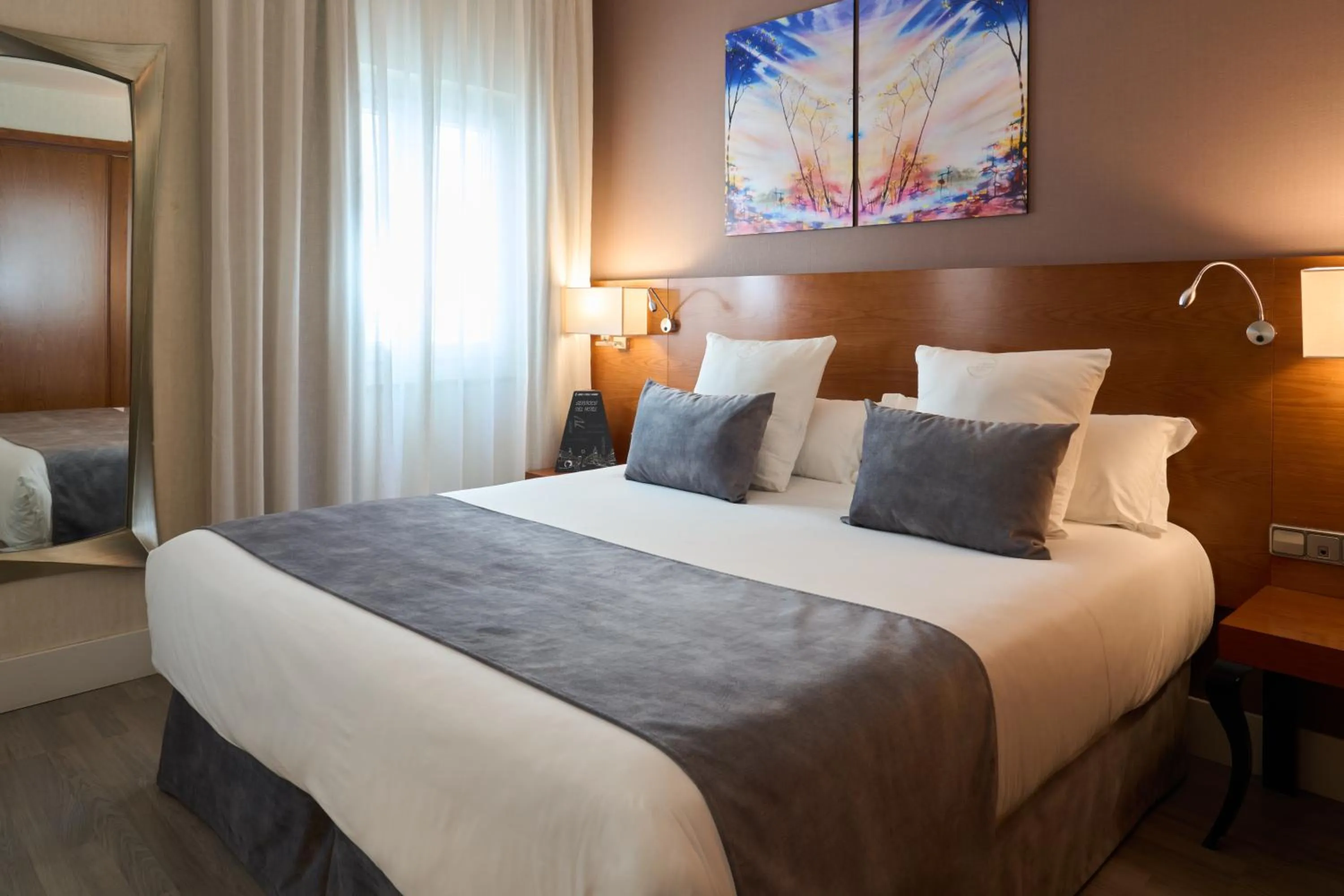 Bed in Hotel Puerta de Toledo