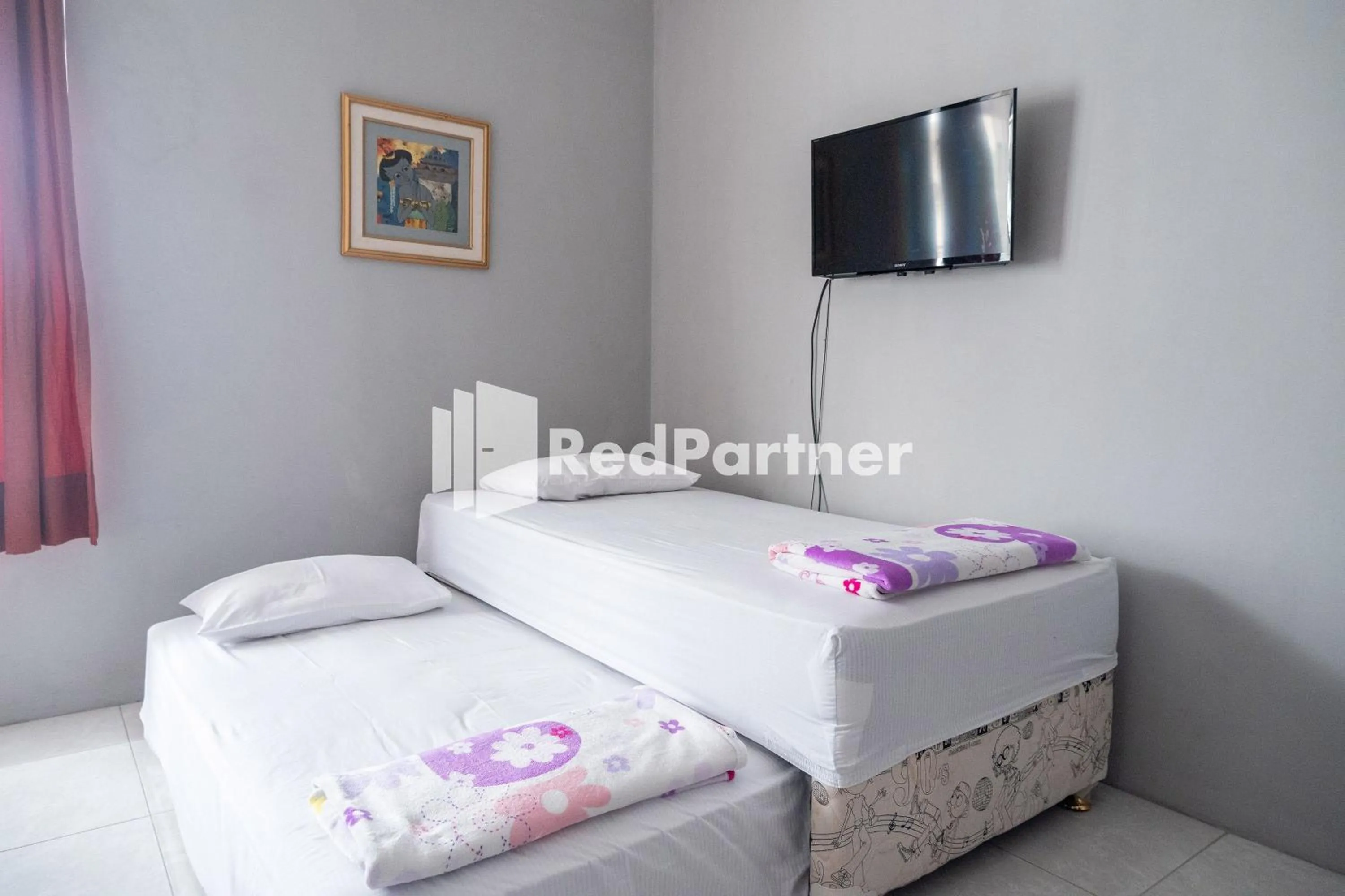 Bedroom, Bed in Omah Capung near Malioboro Area Mitra RedDoorz
