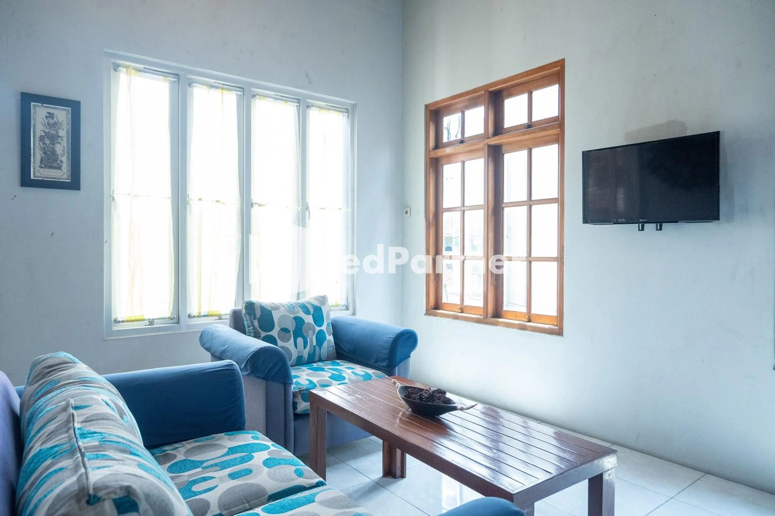 Communal lounge/ TV room in Omah Capung near Malioboro Area Mitra RedDoorz
