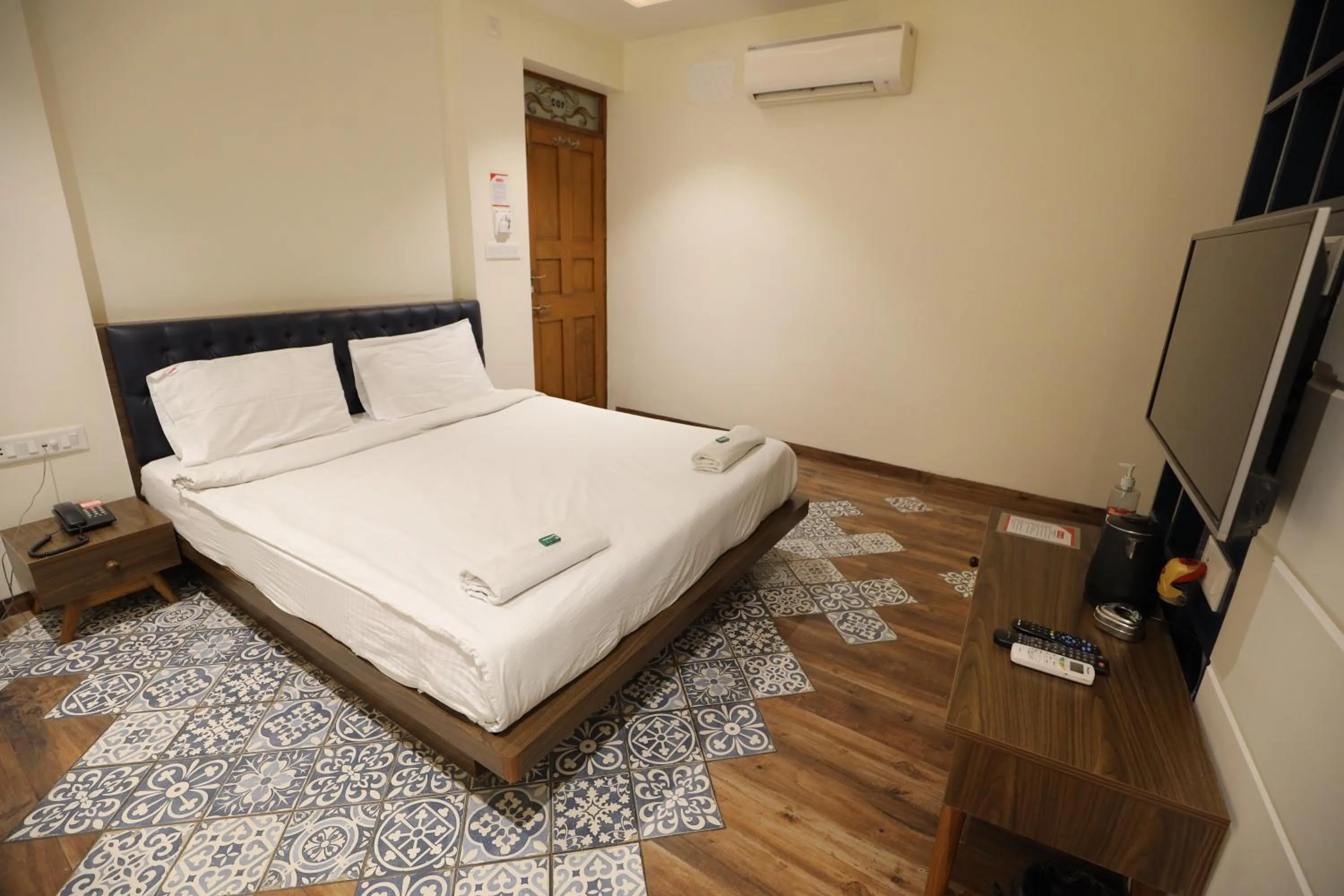 Bed in Hotel Sudarshan Palace