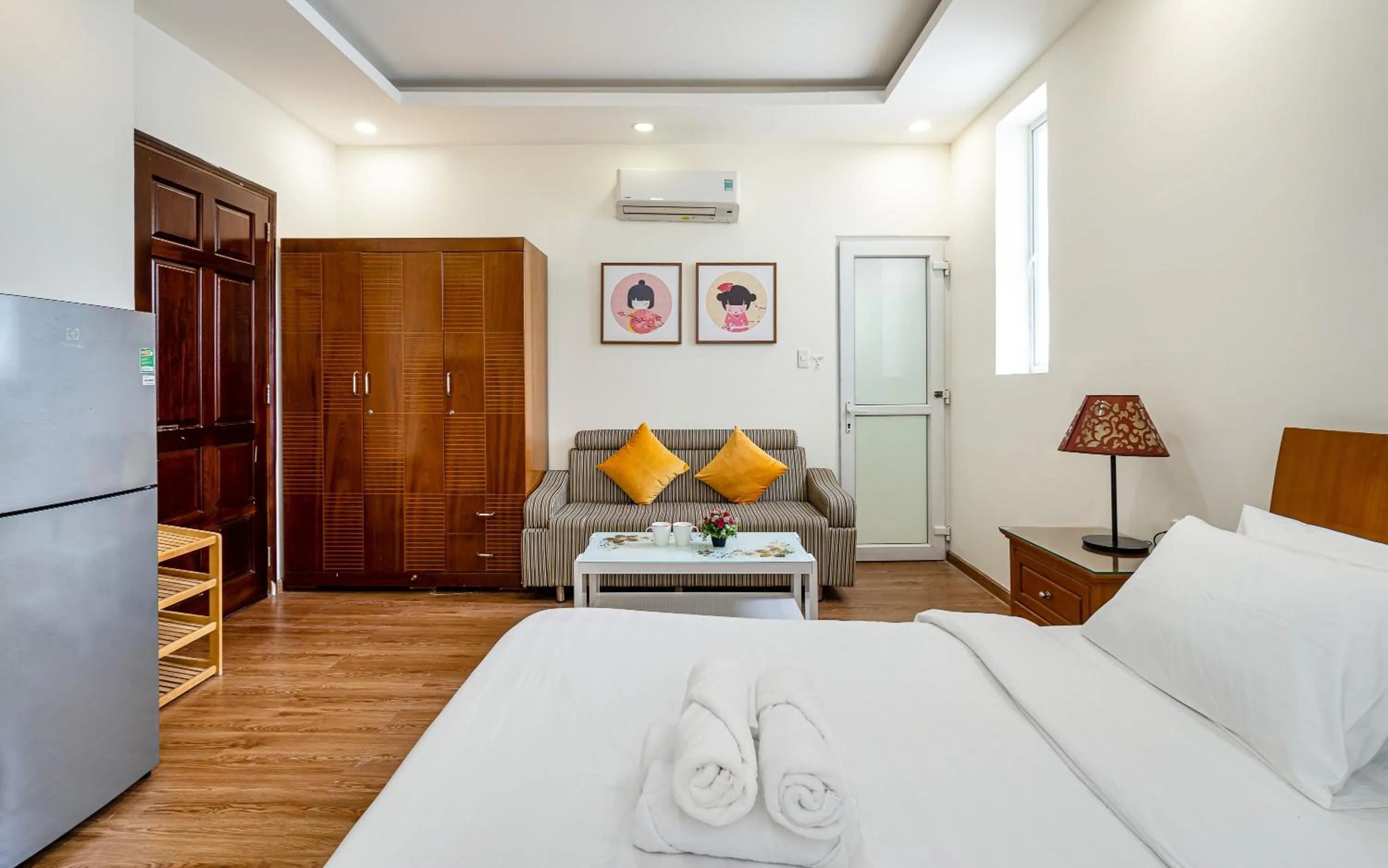 Living room, Bed in WE HOME Japan Town