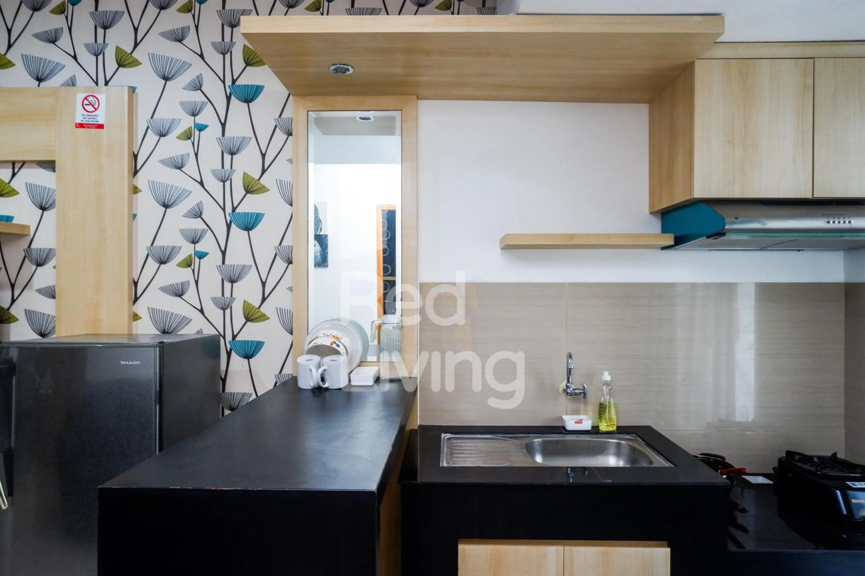 Kitchen or kitchenette in RedLiving Apartemen Star Semarang - Sky Tower Lantai 22