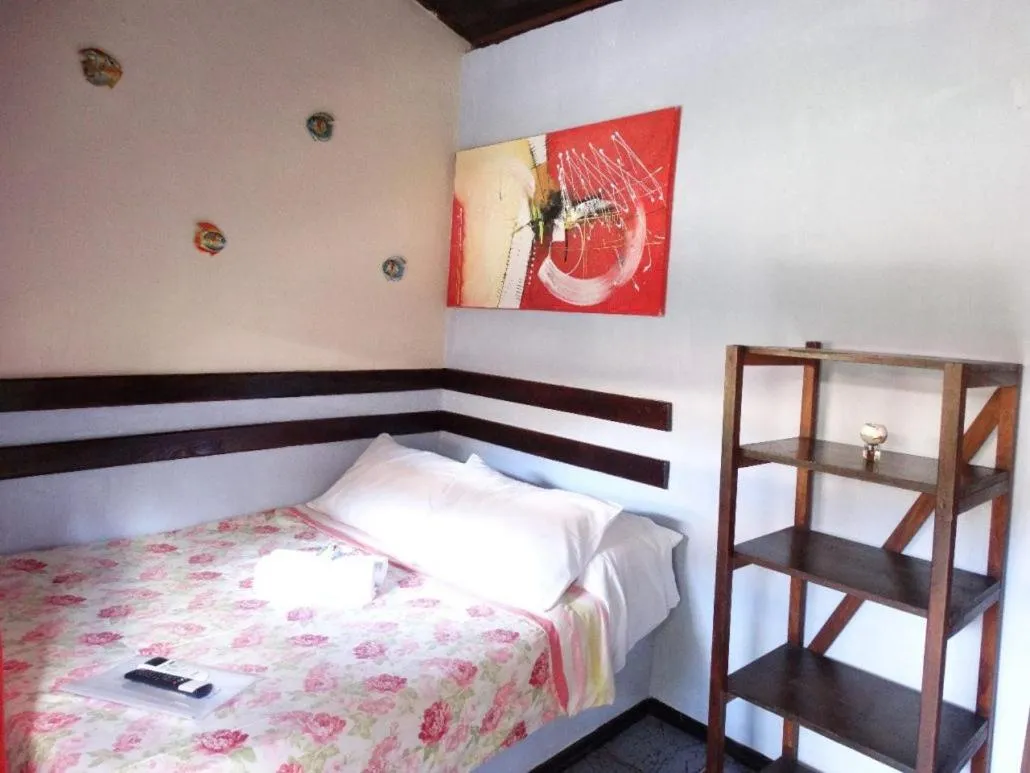 Bed in Pousada Refúgio Do Capitão