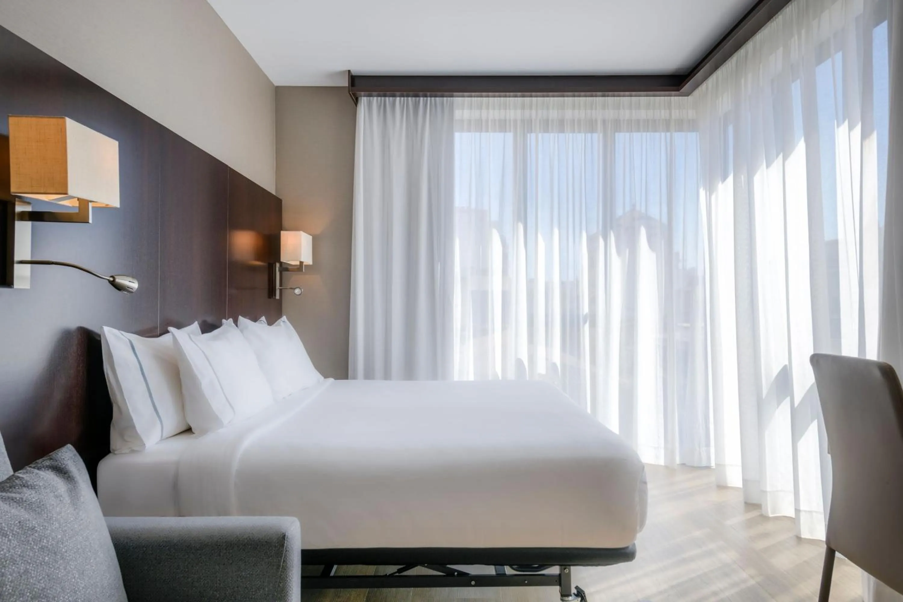 Photo of the whole room, Bed in AC Hotel Ciutat de Palma by Marriott