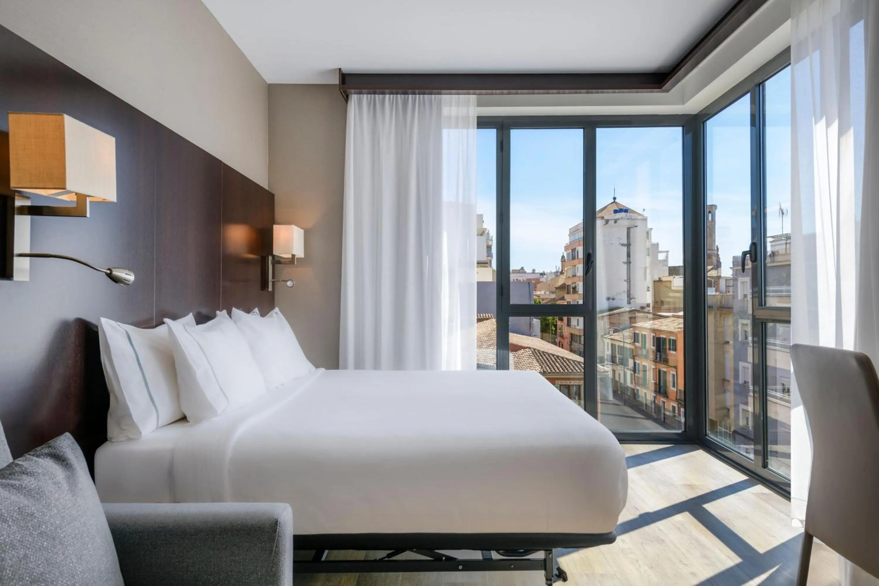 Photo of the whole room, Bed in AC Hotel Ciutat de Palma by Marriott