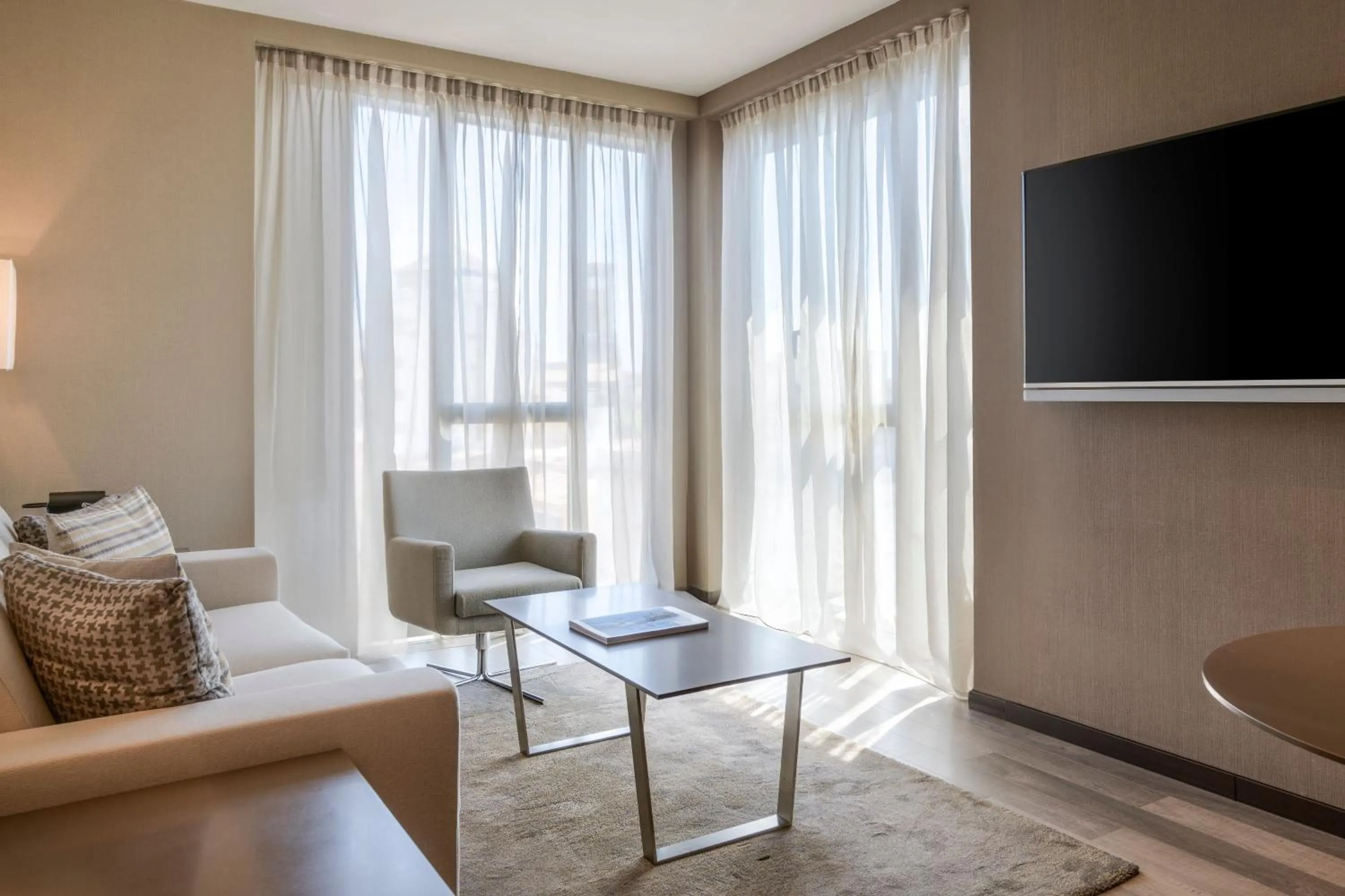 Living room in AC Hotel Ciutat de Palma by Marriott