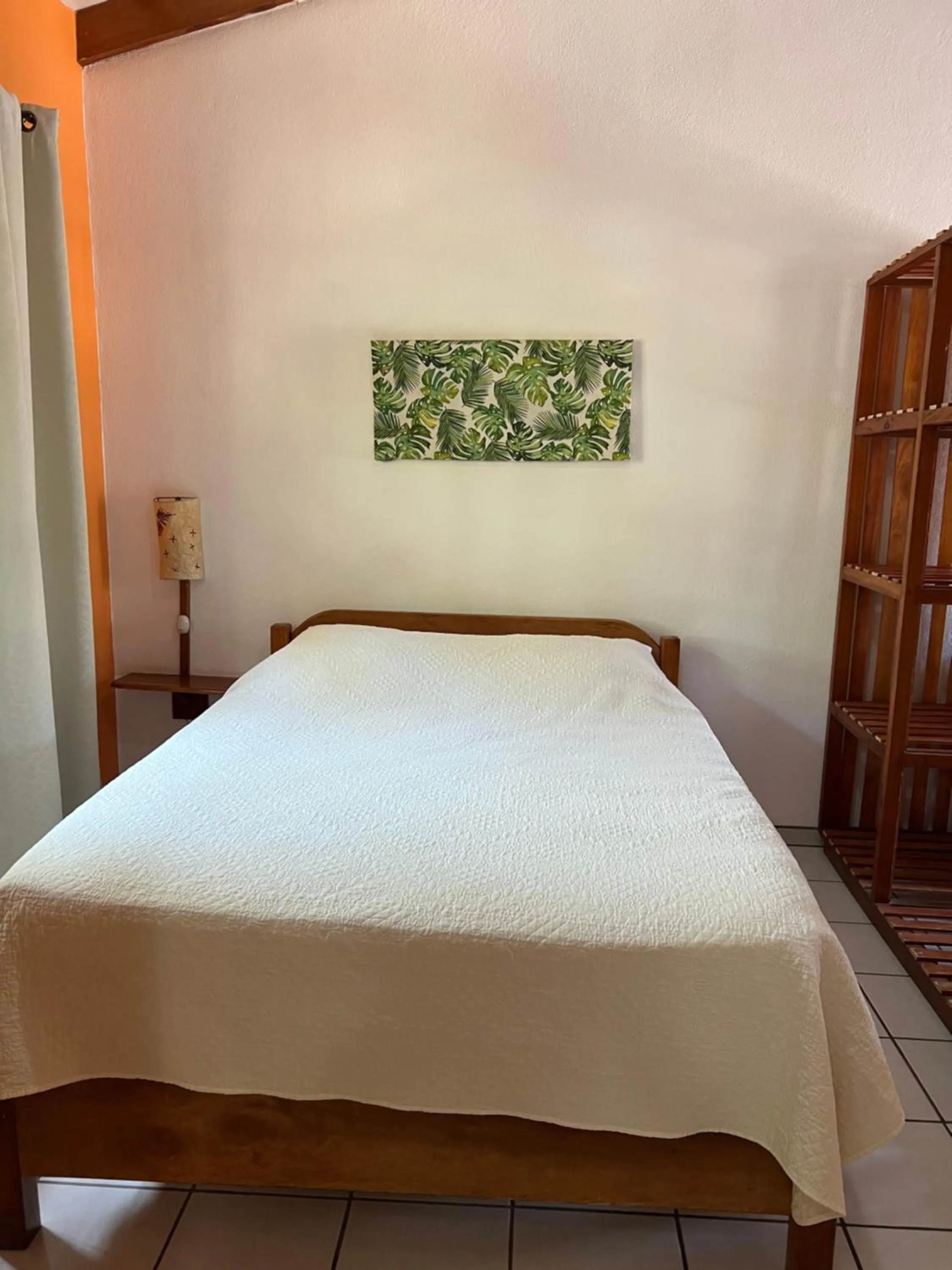 Bed in Cabinas El Colibri, Apart Hotel
