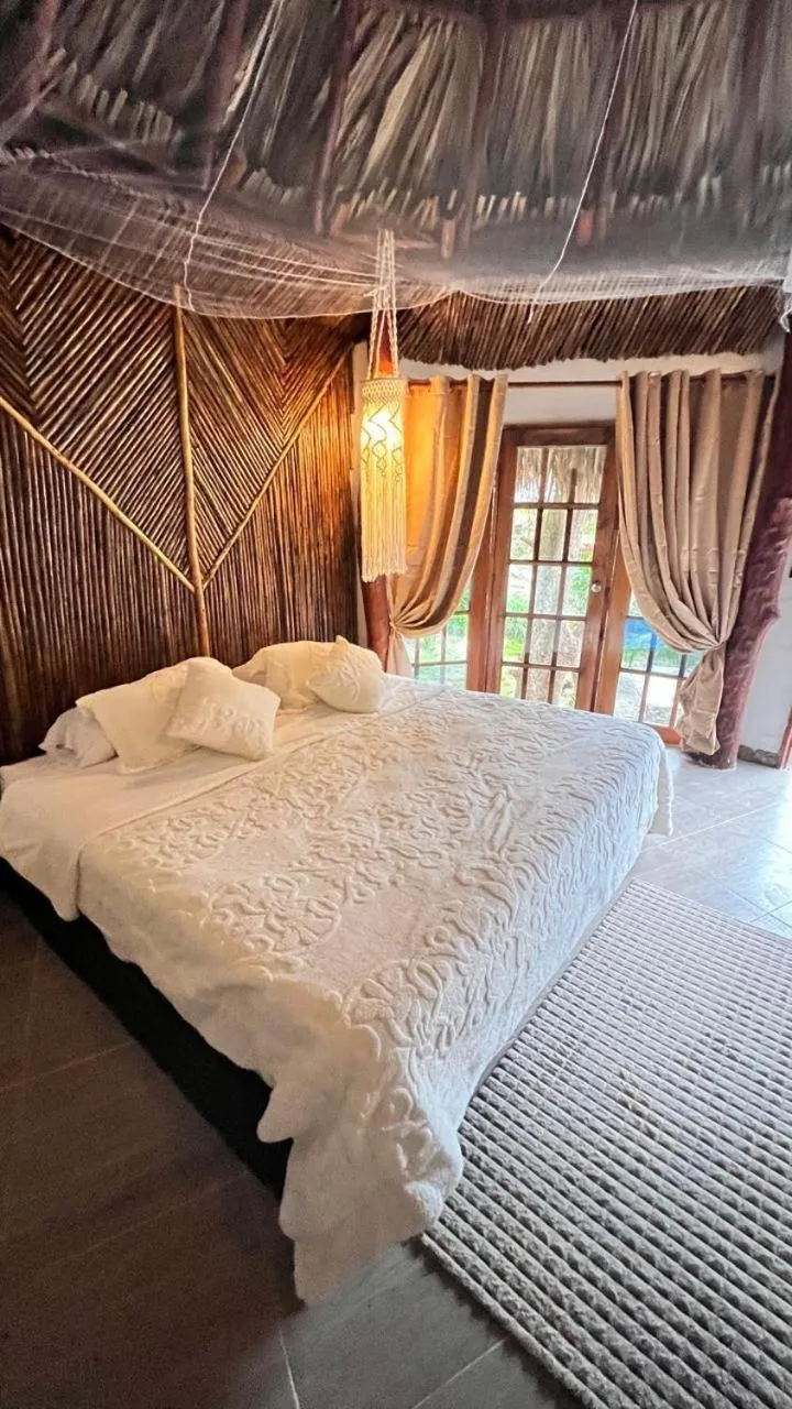 Bed in Tawaca Ecohotel