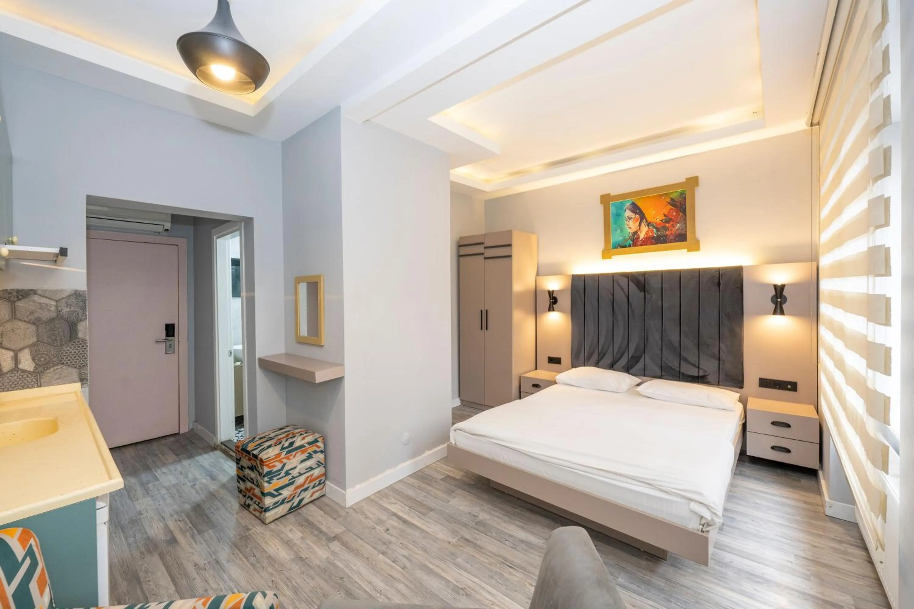 Bed in Cirrus Suites